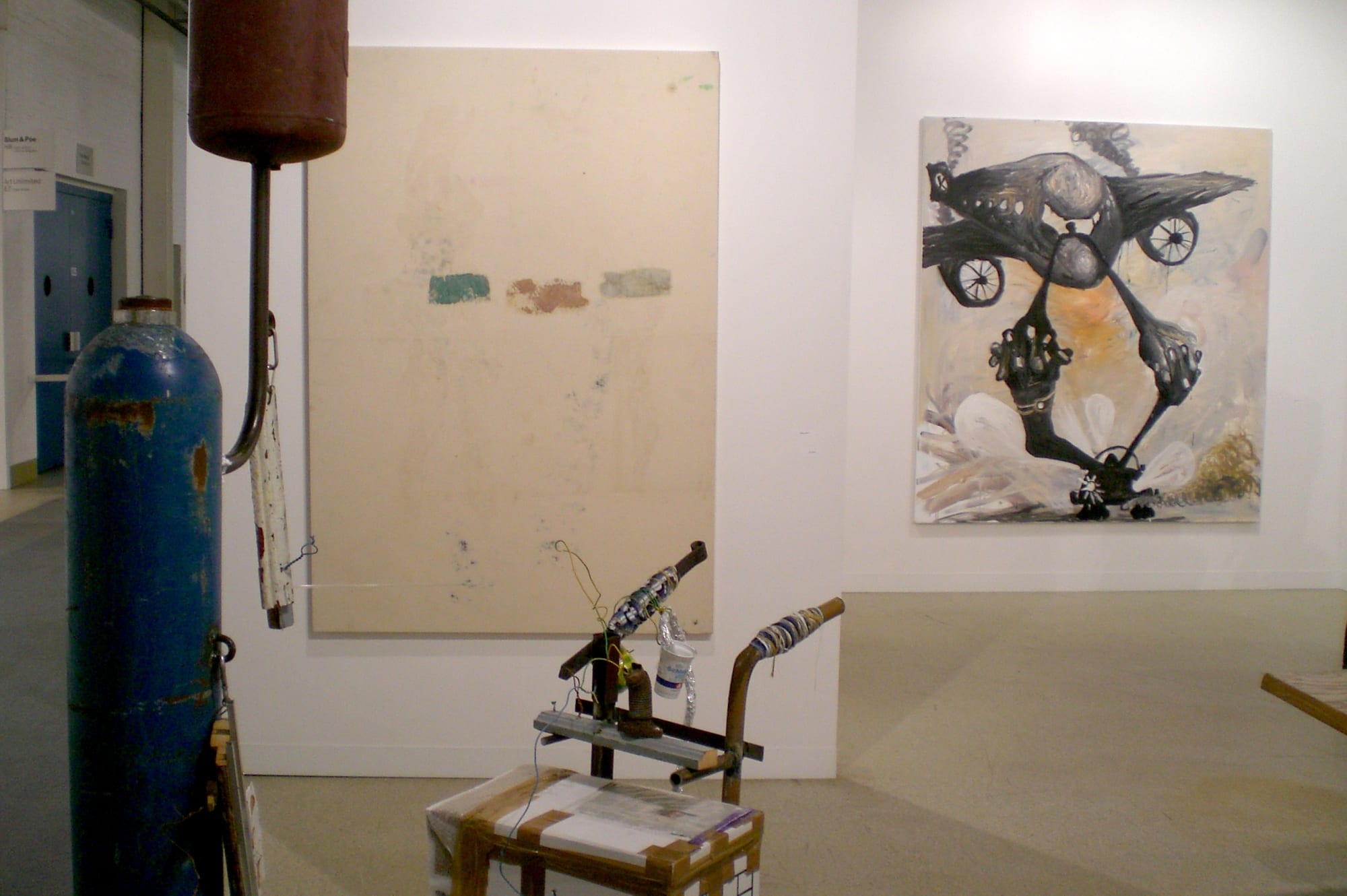 Installation view of the AKG booth at Basel 2007, featuring works by Sergej Jensen.