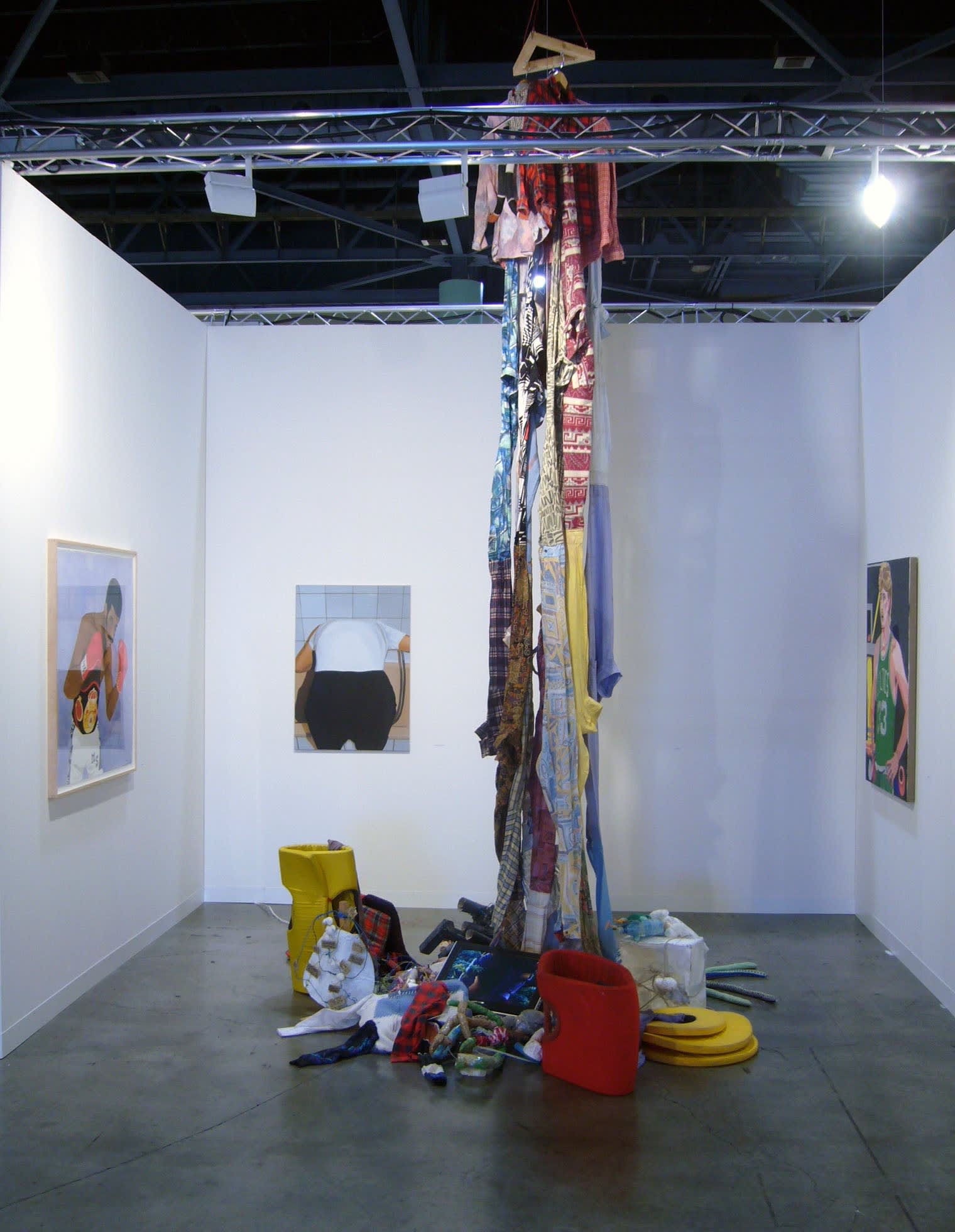 Installation view of the booth at Art Basel Miami 2007. John Bock's installation featured.