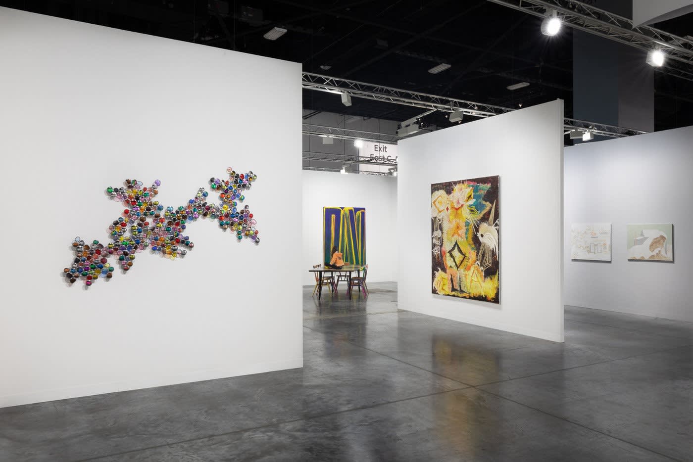 Installation views during Art Basel. Sculptures, Paintings, and more, including a Jim Lambie sunglasses wall sculpture.