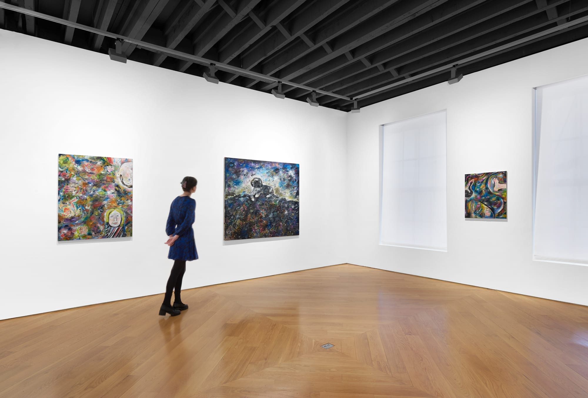 Person walking through exhibition.