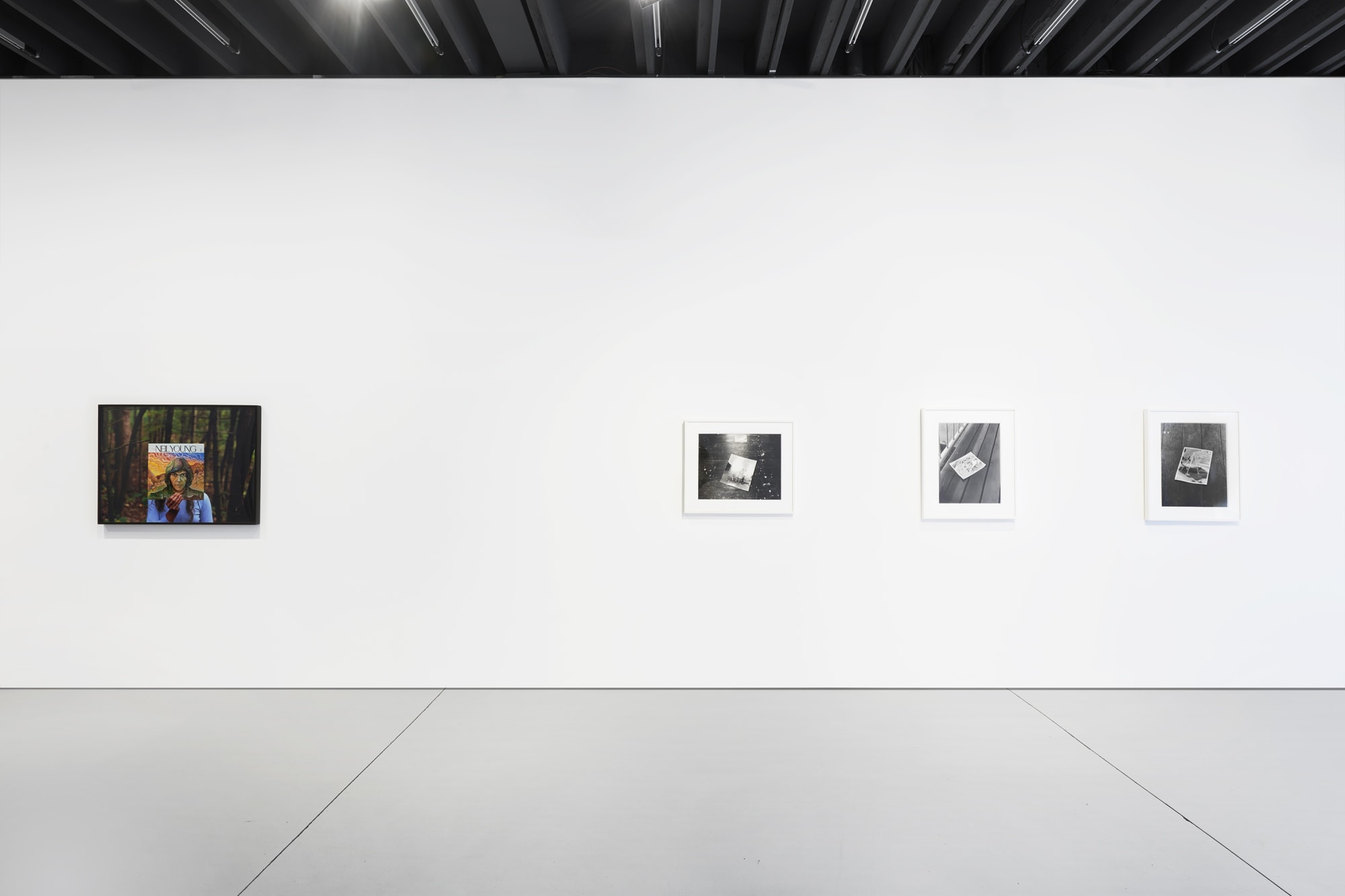 Installation view of the 2022 exhibition "Photographic Pictures" with view of white floors, walls, artworks and cieling