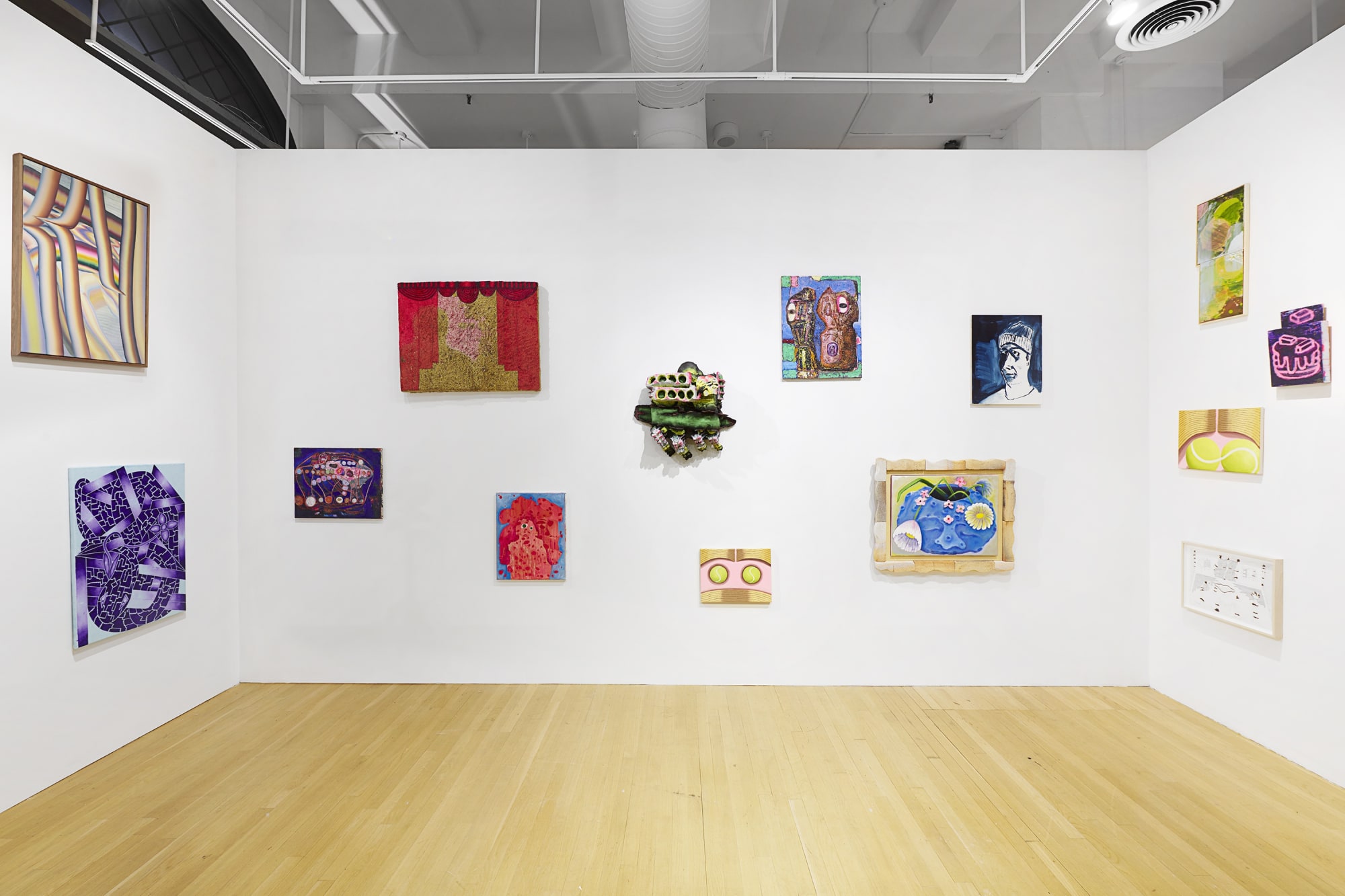 Installation view of the 2023 exhibition “Friends & Family” with view of wood floors, walls, artworks and ceiling.