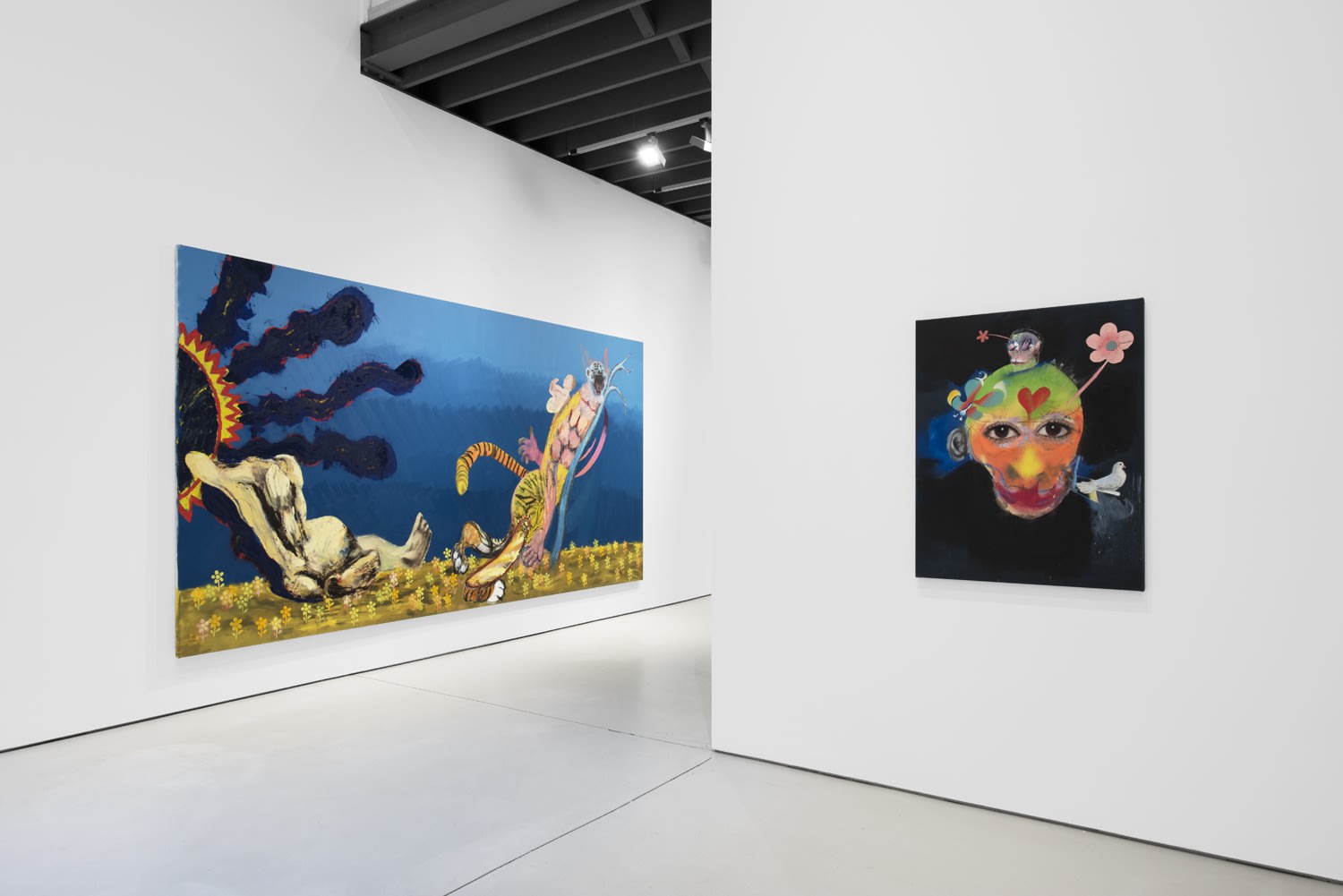 Installation view of the 2023 exhibition “Alessandro Pessoli: Pluto is my Master” with view of white floors, walls, artworks and ceiling.