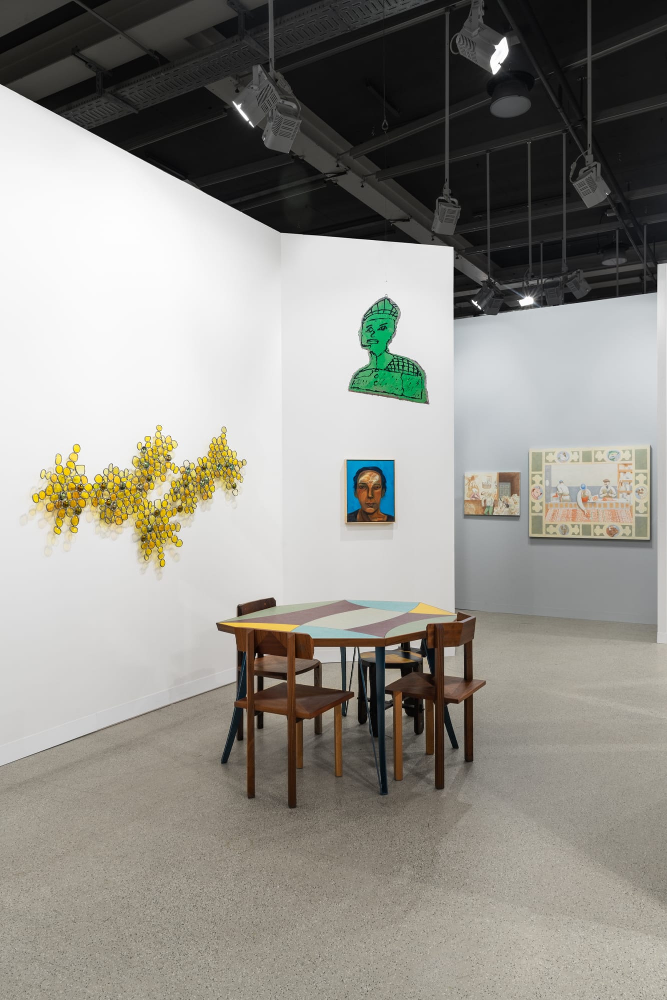 Installation view of Art Basel 2023 booth K10 with view of floors, walls, artworks and ceiling.