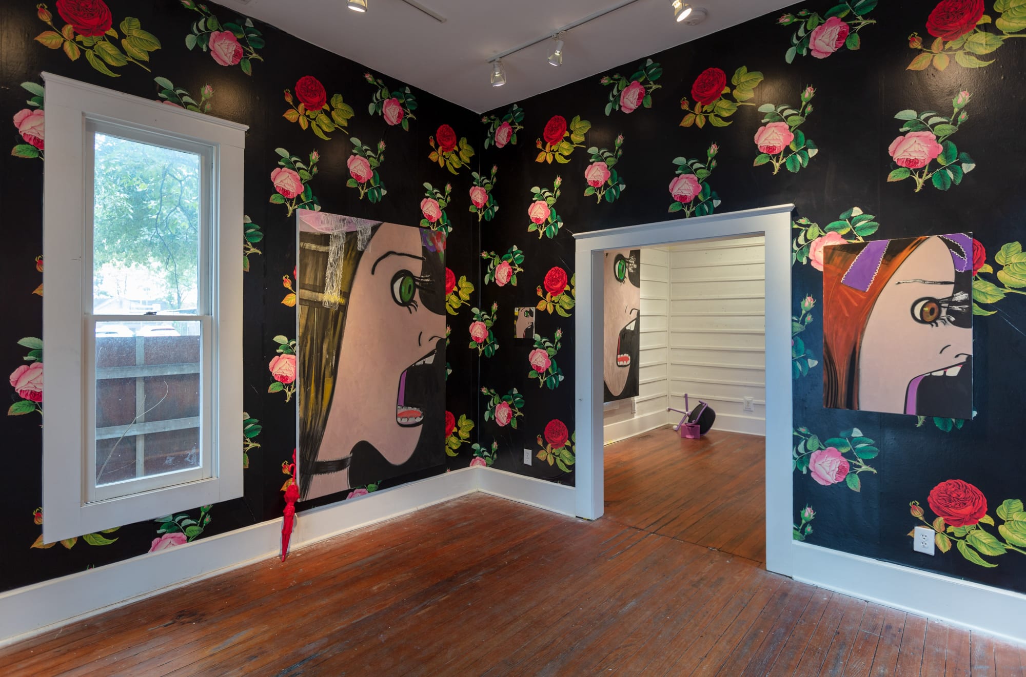 Installation views of Ellen Berkenblit's one night only, off-site special project, featuring paintings and sculpture. Interior of the site, one painting pictured.