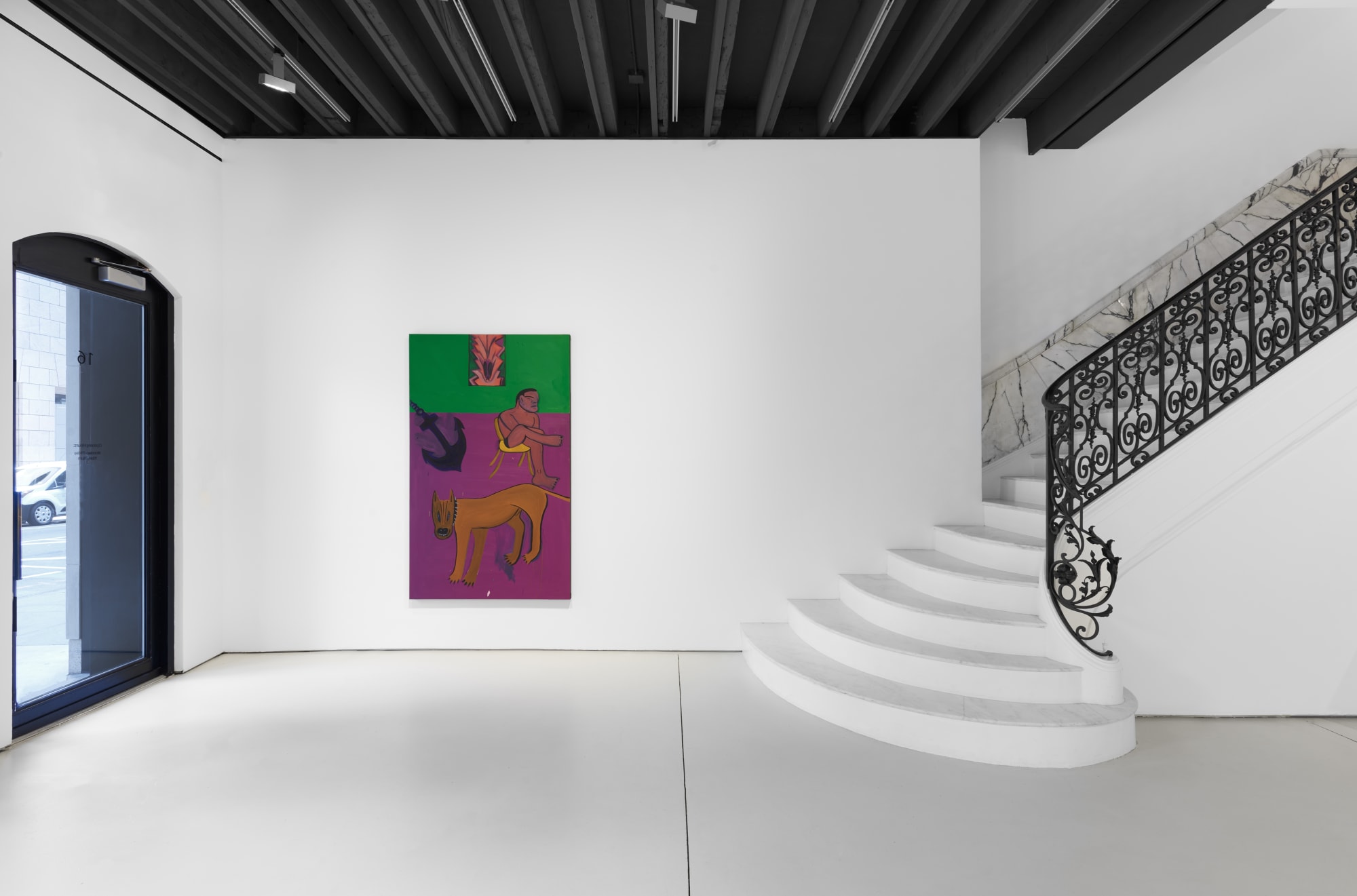 Installation view of the 2023 exhibition “Marcus Jahmal: Interiors” with view of white floors, walls, artwork, stairs, and ceiling.