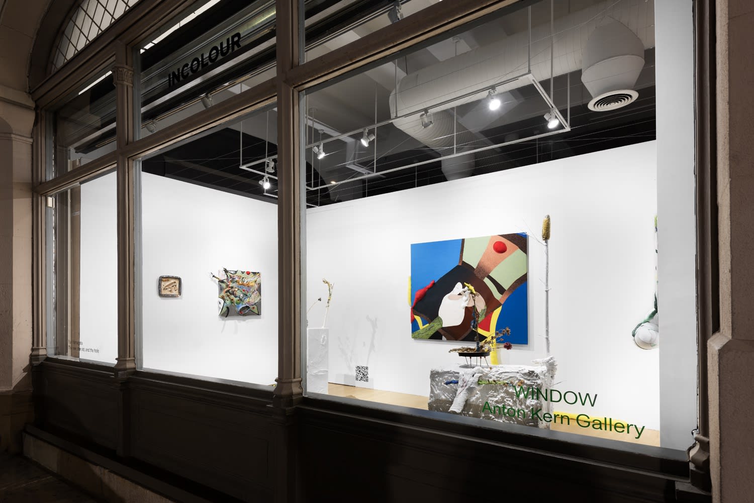 Installation view of the 2023 exhibition “Yuli Yamagata: The new, the old, and the hole” with exterior view of wood floors, walls, artworks and ceiling.