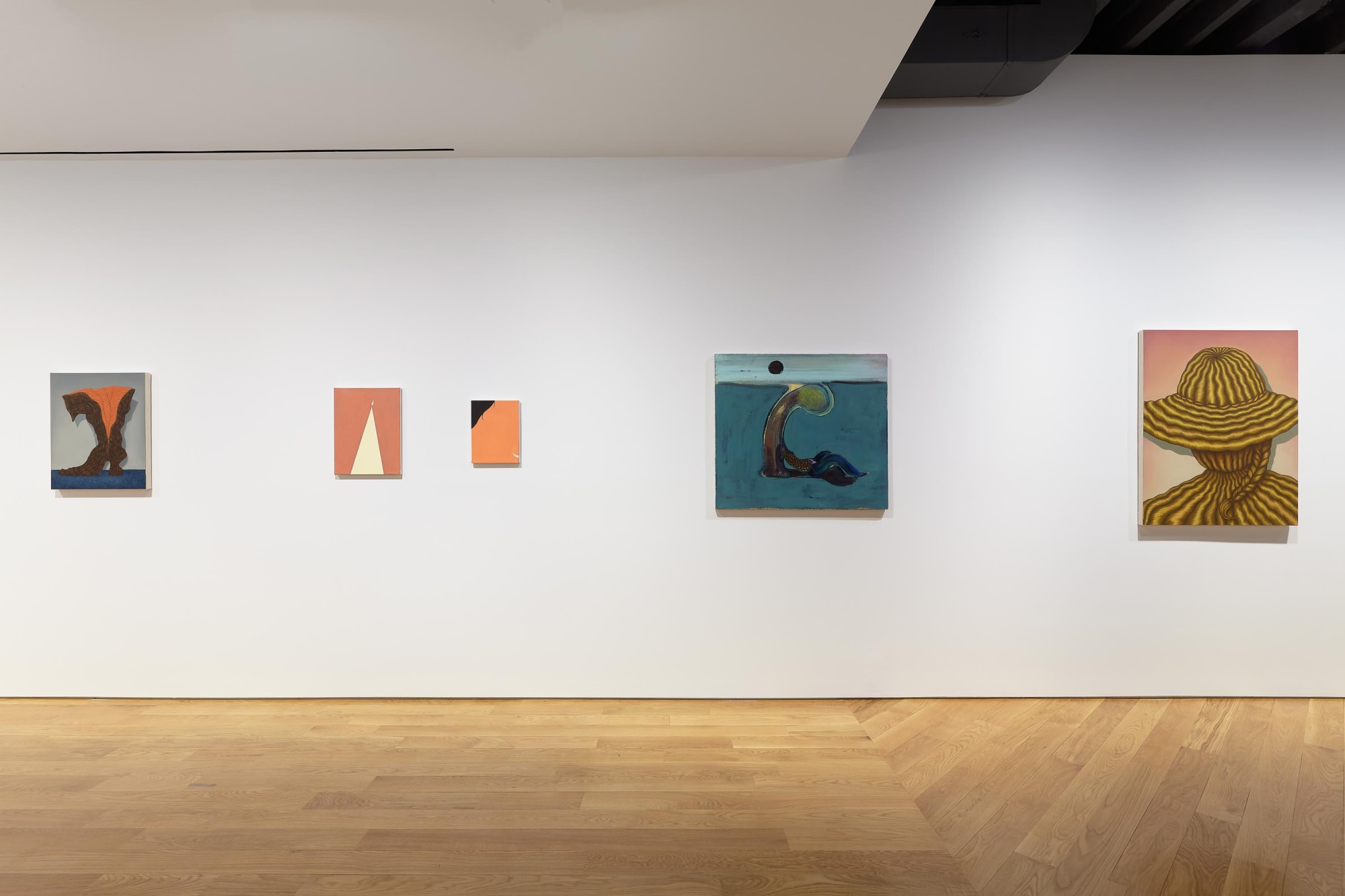 Installation view of 10 Exhibition, showing both works of Alice Tippit as well as a solo piece from Heidi Hahn.