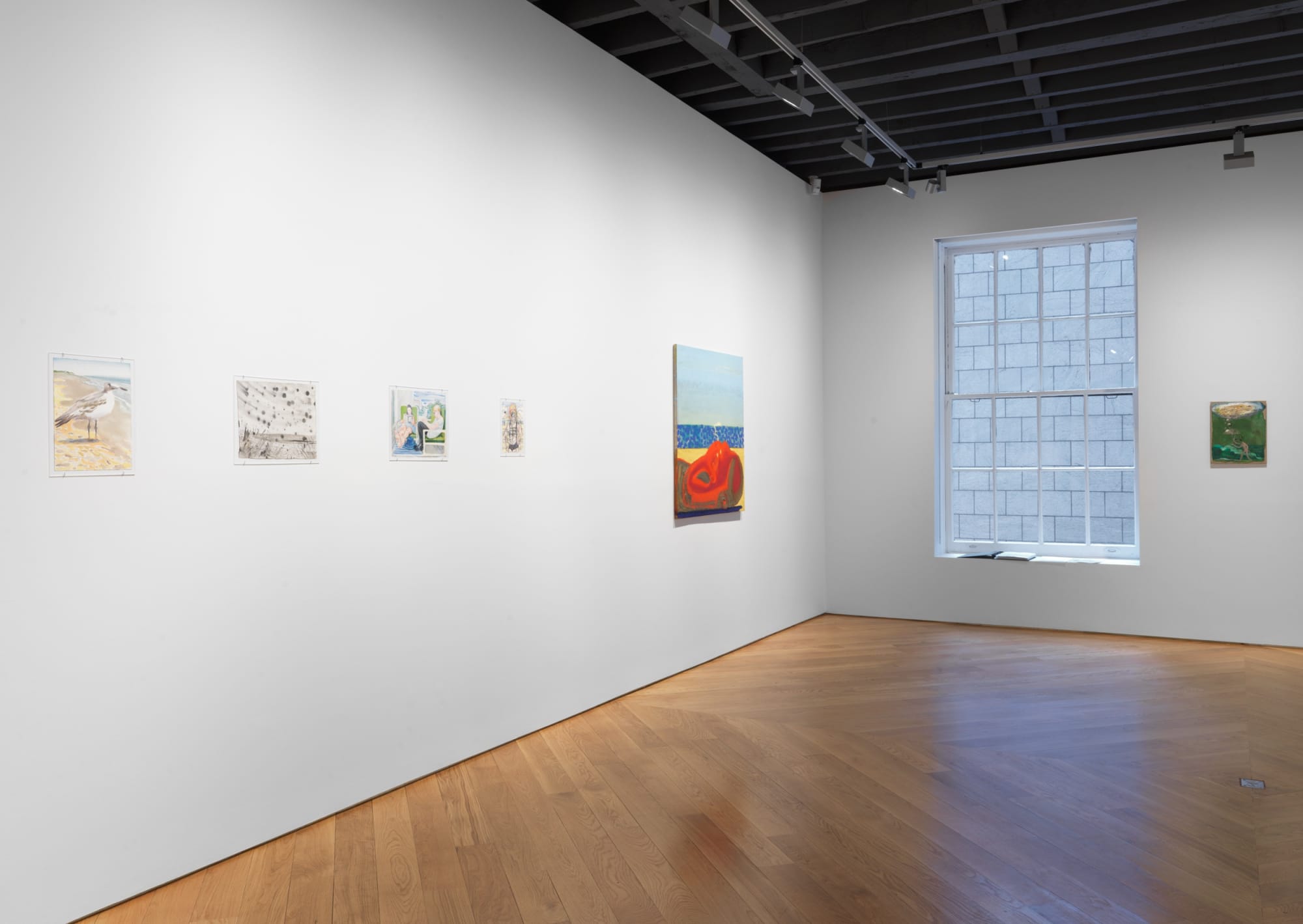 Installation view of Nicole Eisenman show, four paintings visible.