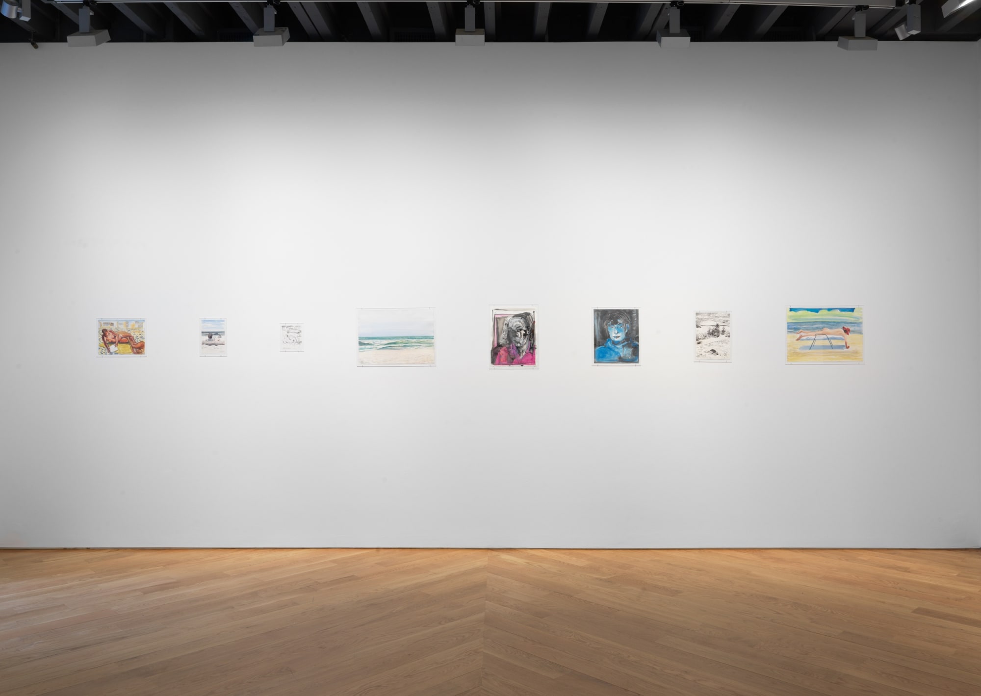 Installation view of Nicole Eisenman show, straight shot of a few paintings featured.