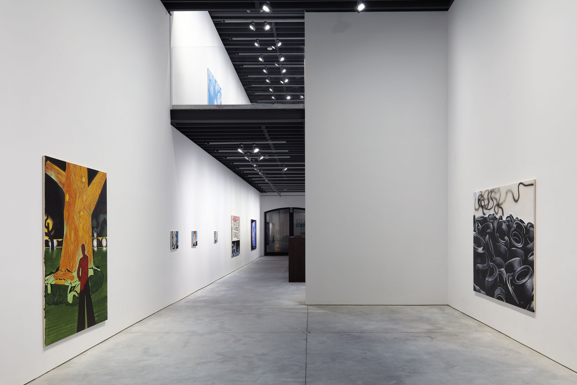 Installation view of Wilhem Sasnal's solo show. First floor view from back of gallery.