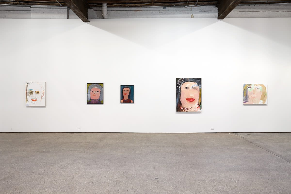 Installation view of Margot Bergman's show. Three portraits featured.
