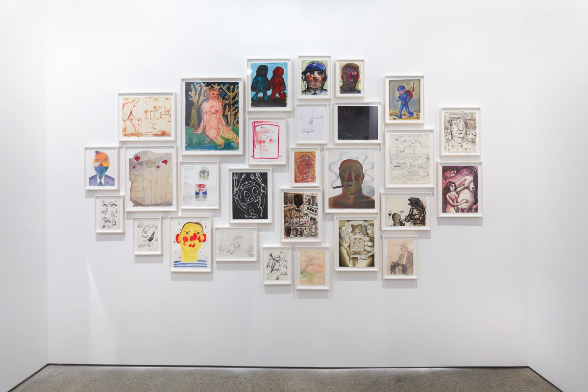 Installation view of Nicole Eisenman solo show. More drawings hung salon-style.