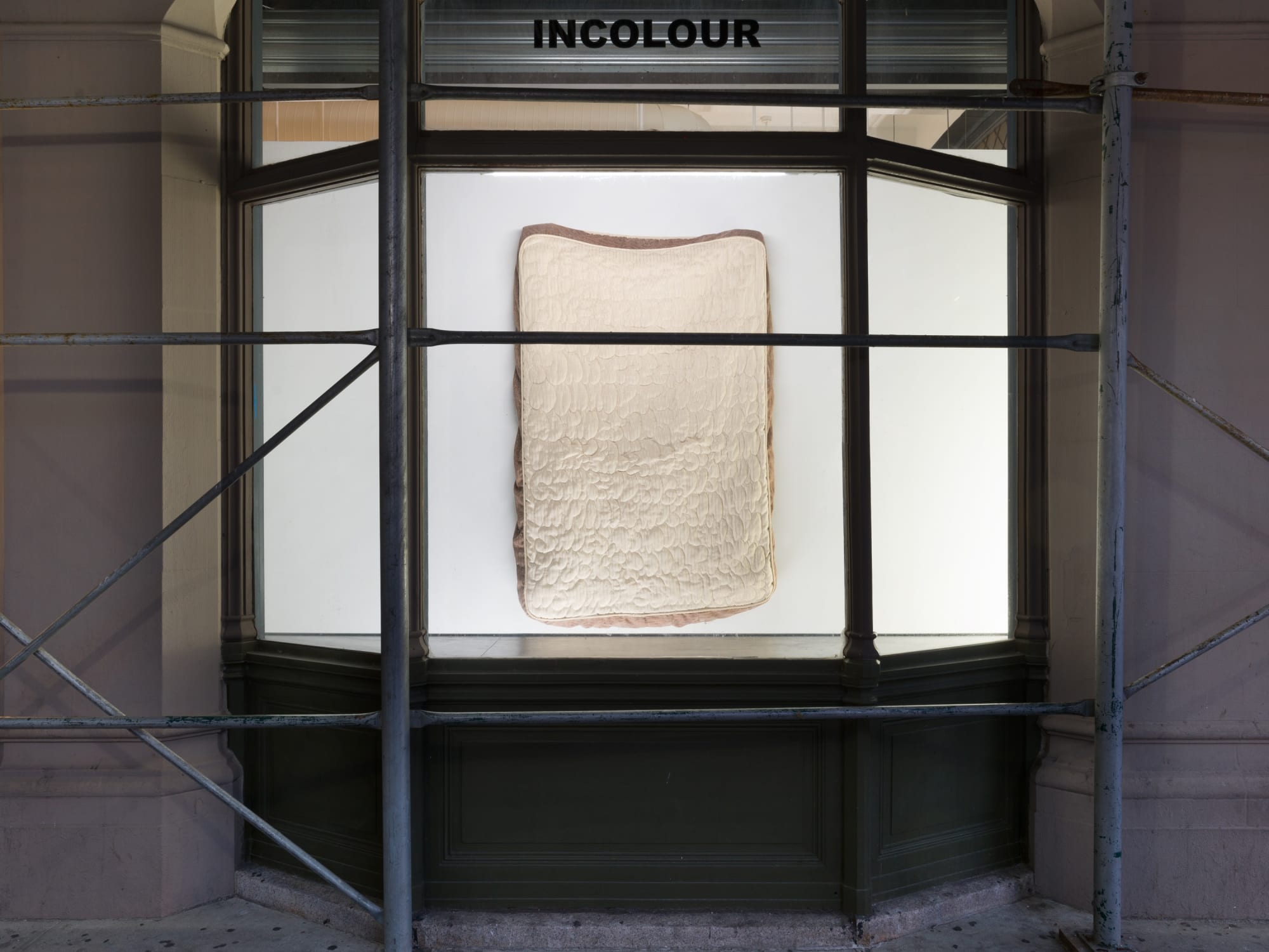 Installation view of Richard Hughes' WINDOW show, mattress work shown.