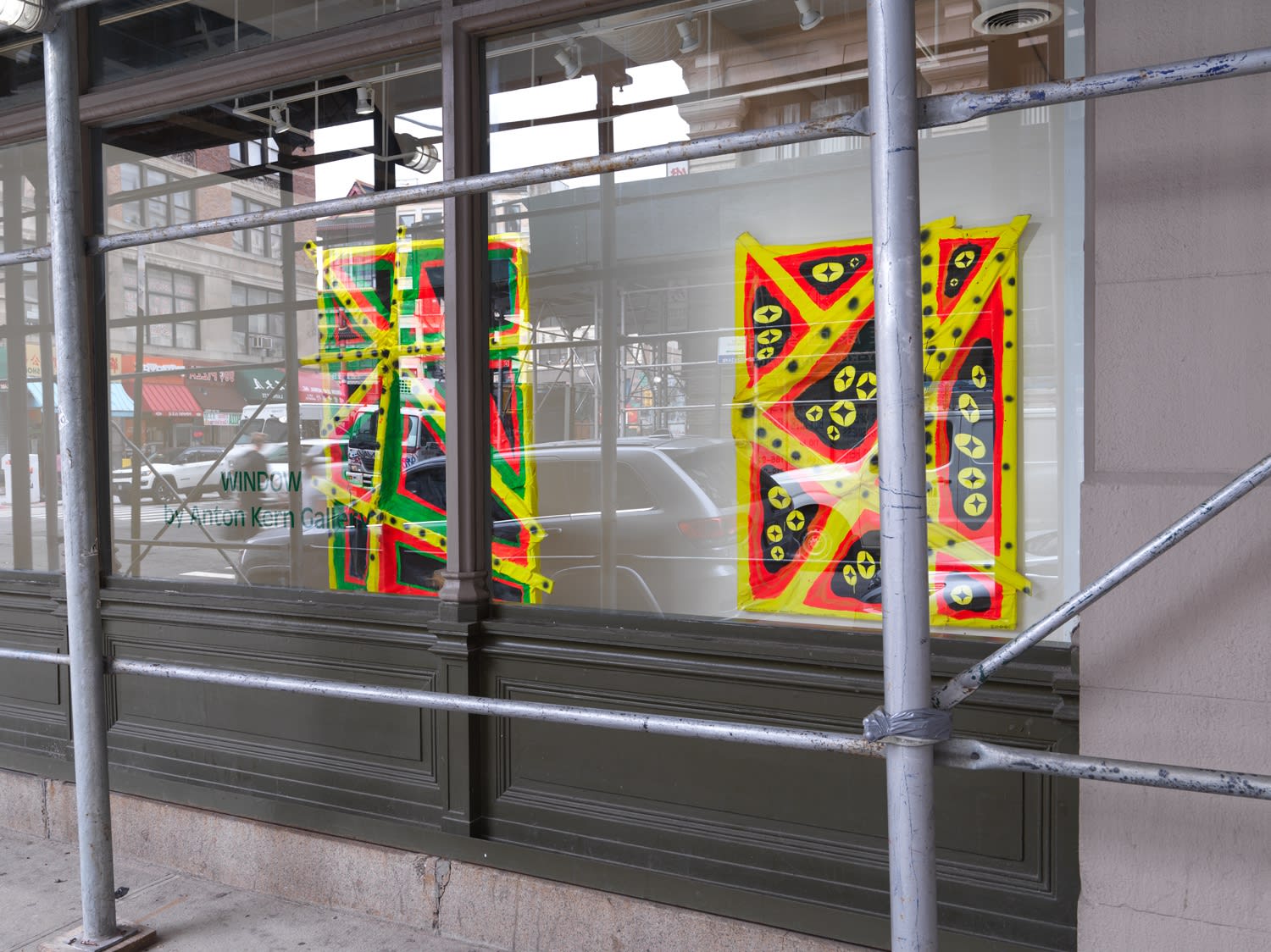 Installation view of Chris Martin's show at WINDOW. Angled view from street.