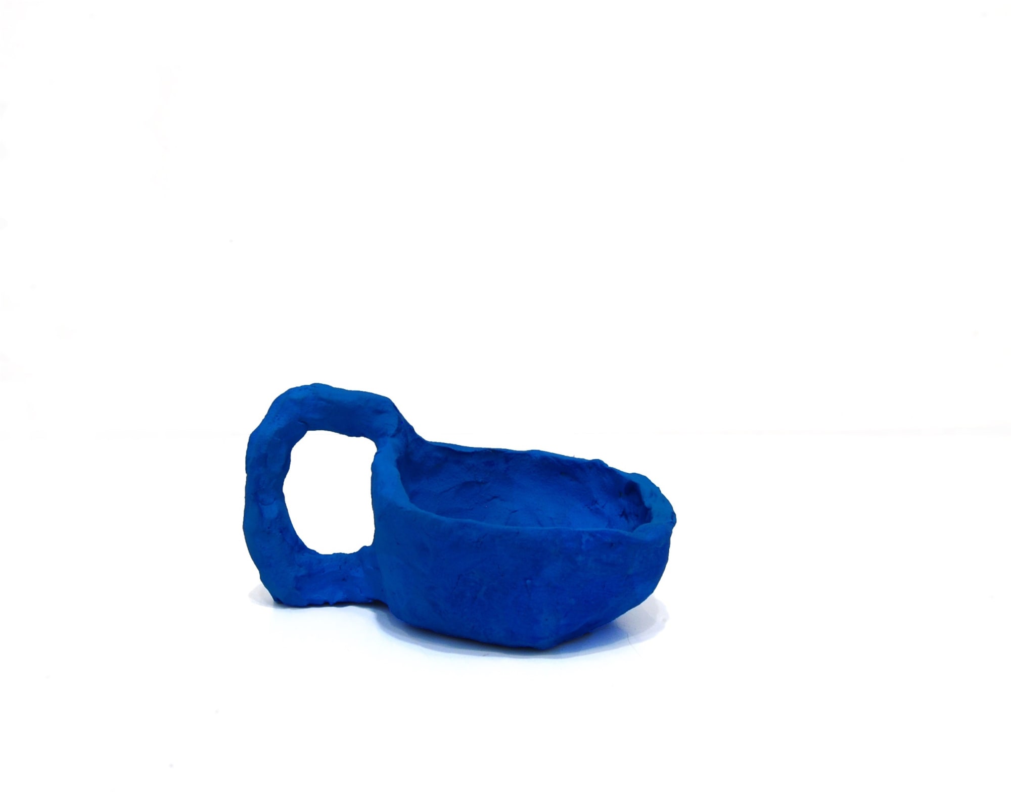 Blue ceramic tea cup with large handle