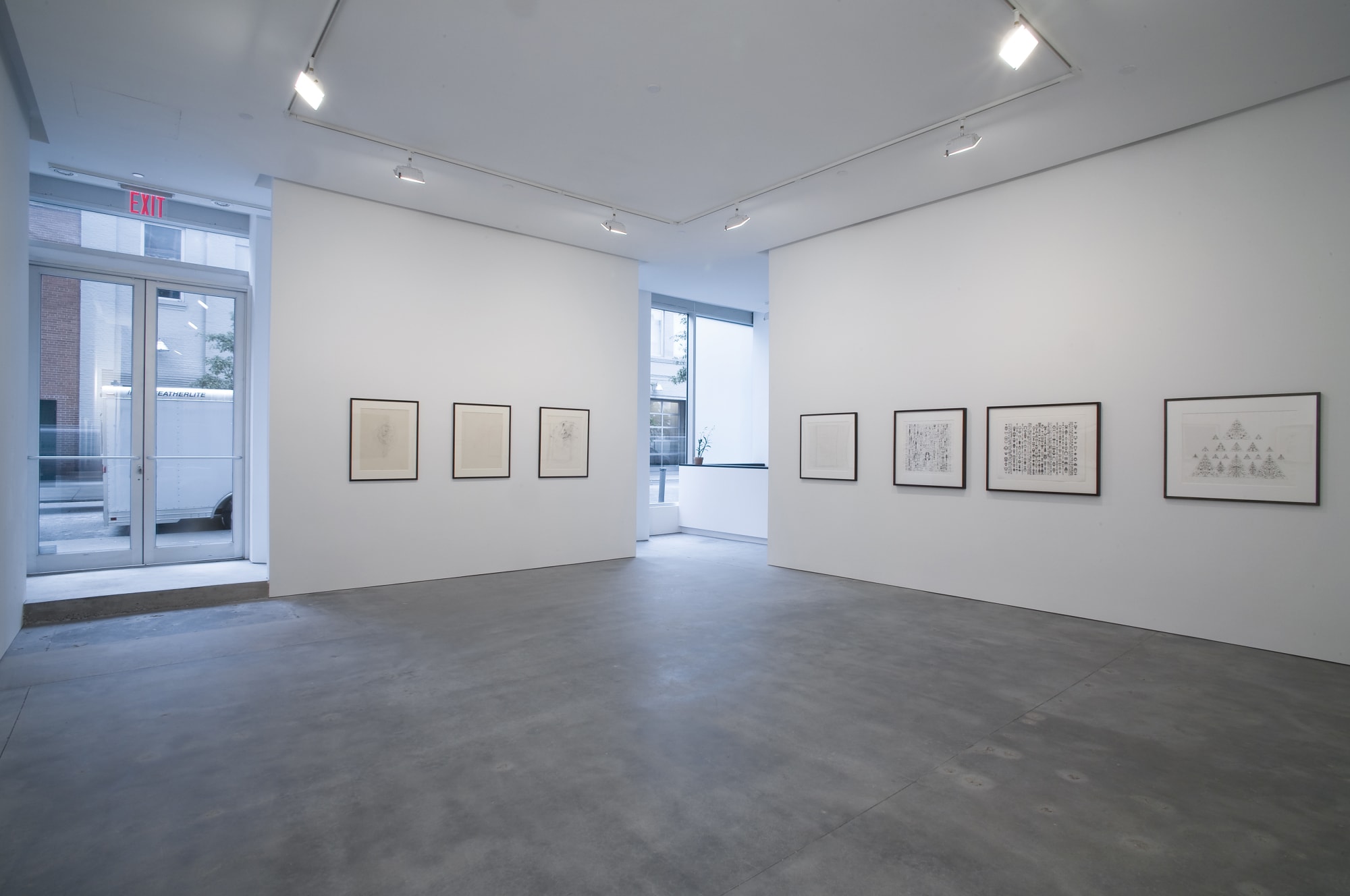 Installation view of Susan Inglett Gallery with 2d works by Bruce Connor hanging on the walls