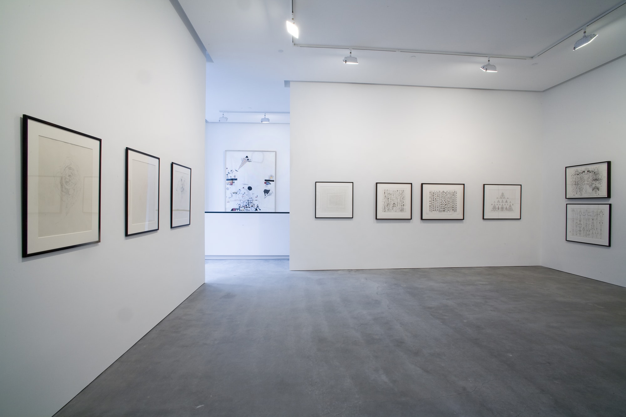 Installation view of Susan Inglett Gallery with 2d works by Bruce Connor hanging on the walls