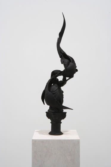 Installation view of Susan Inglett Gallery with two Eli Ping sculptures on wooden pedestals