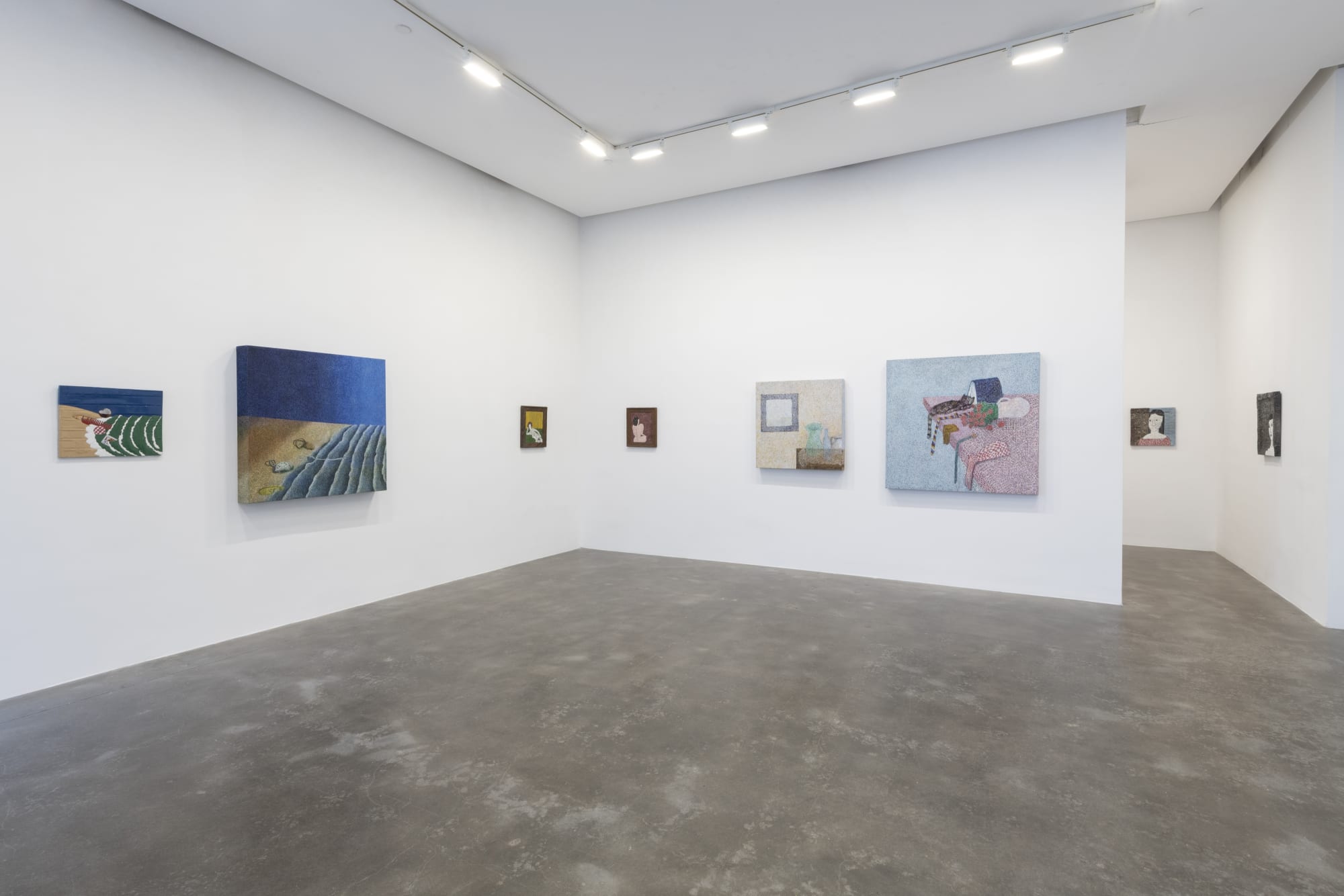 An installation view of Robert Kobayashi's Paint and Tin, showing several pointillist style still lifes and portraits and landscapes made from tin