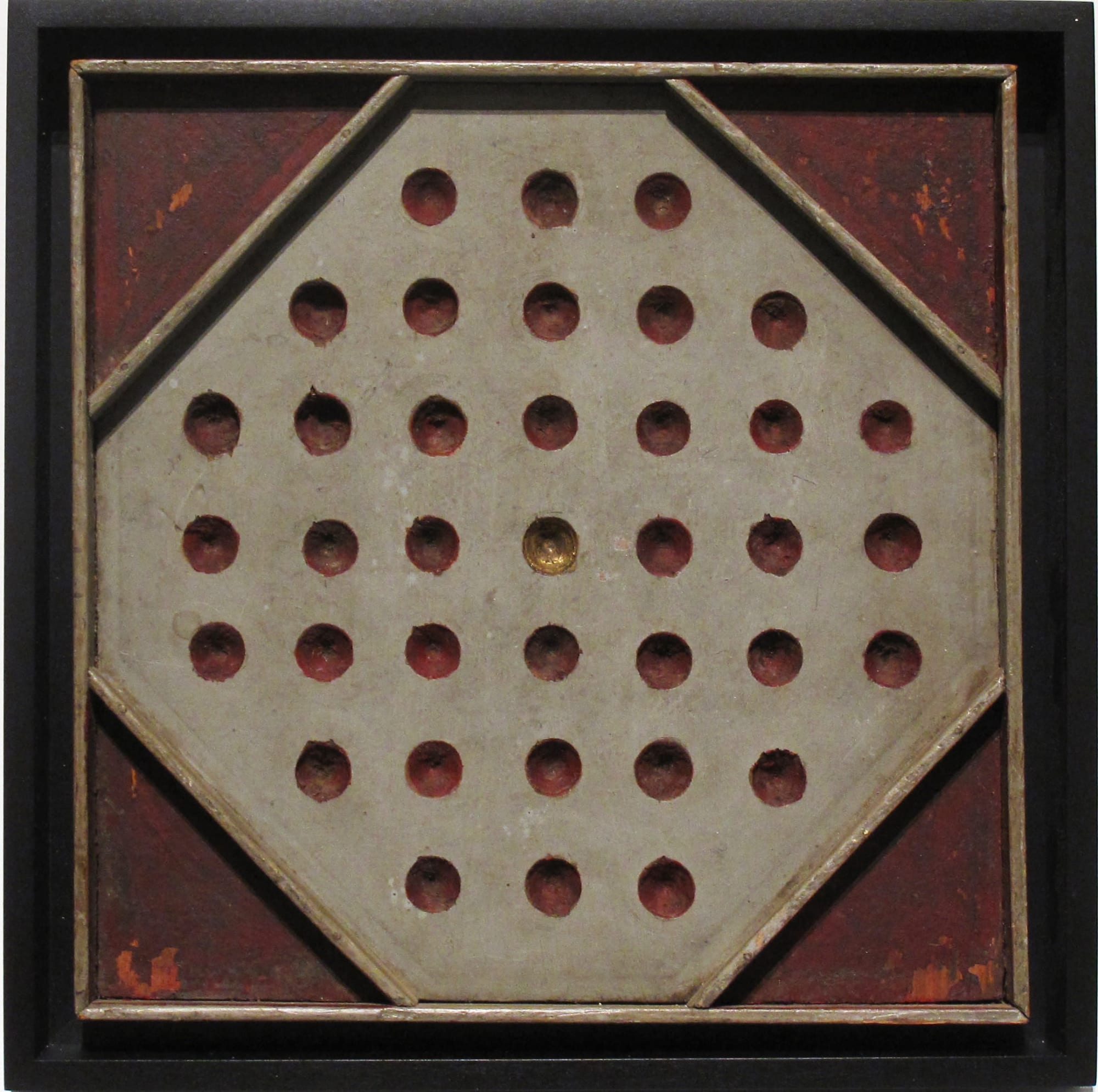 SOLITAIRE GAME BOARD, C. 1900-1910 Joined and carved wood with polychrome 11 1/2 x 11 1/2 in. 29.2 x 29.2 cm. (AU 294)