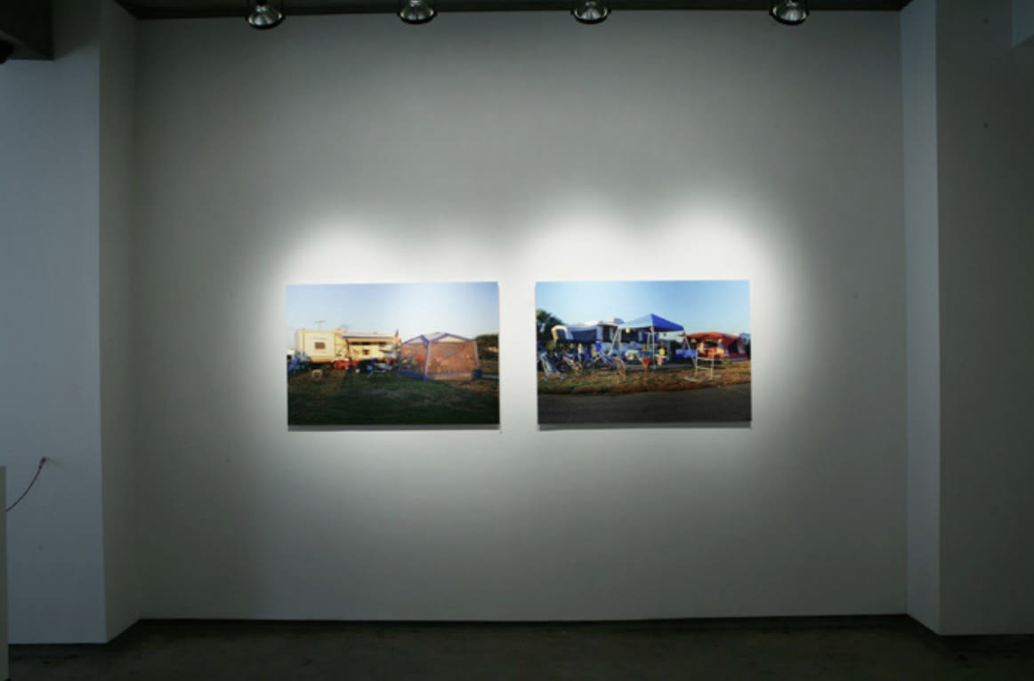 Two pieces on a wall in gallery