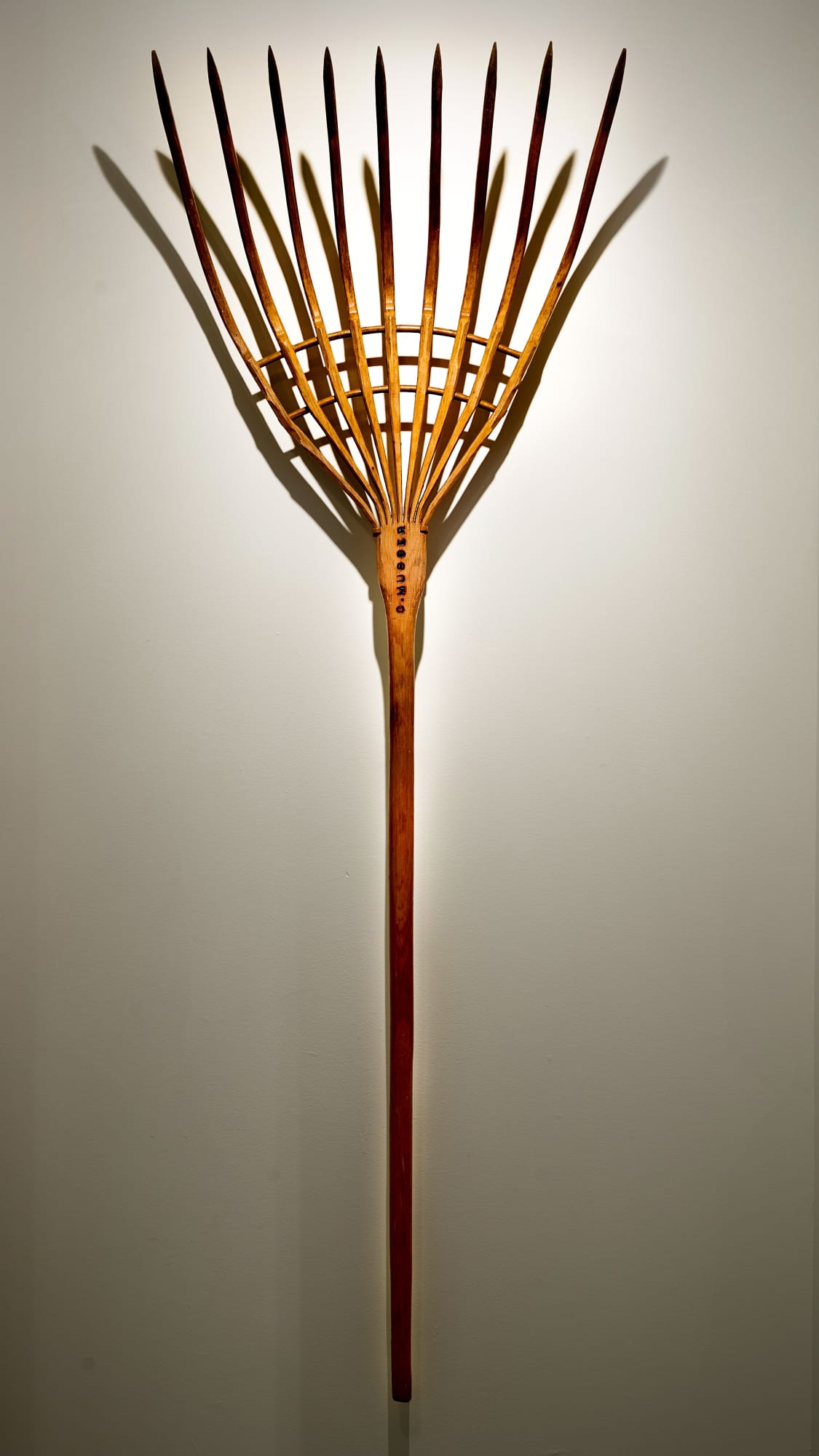 Masterful Hay Fork (Nine Tines), n d. Cut and steam-formed wood (Burned-on stamp reading: "C. Musser") 67 x 24 in. (170.2 x 61 cm.) (VA 45) SOLD