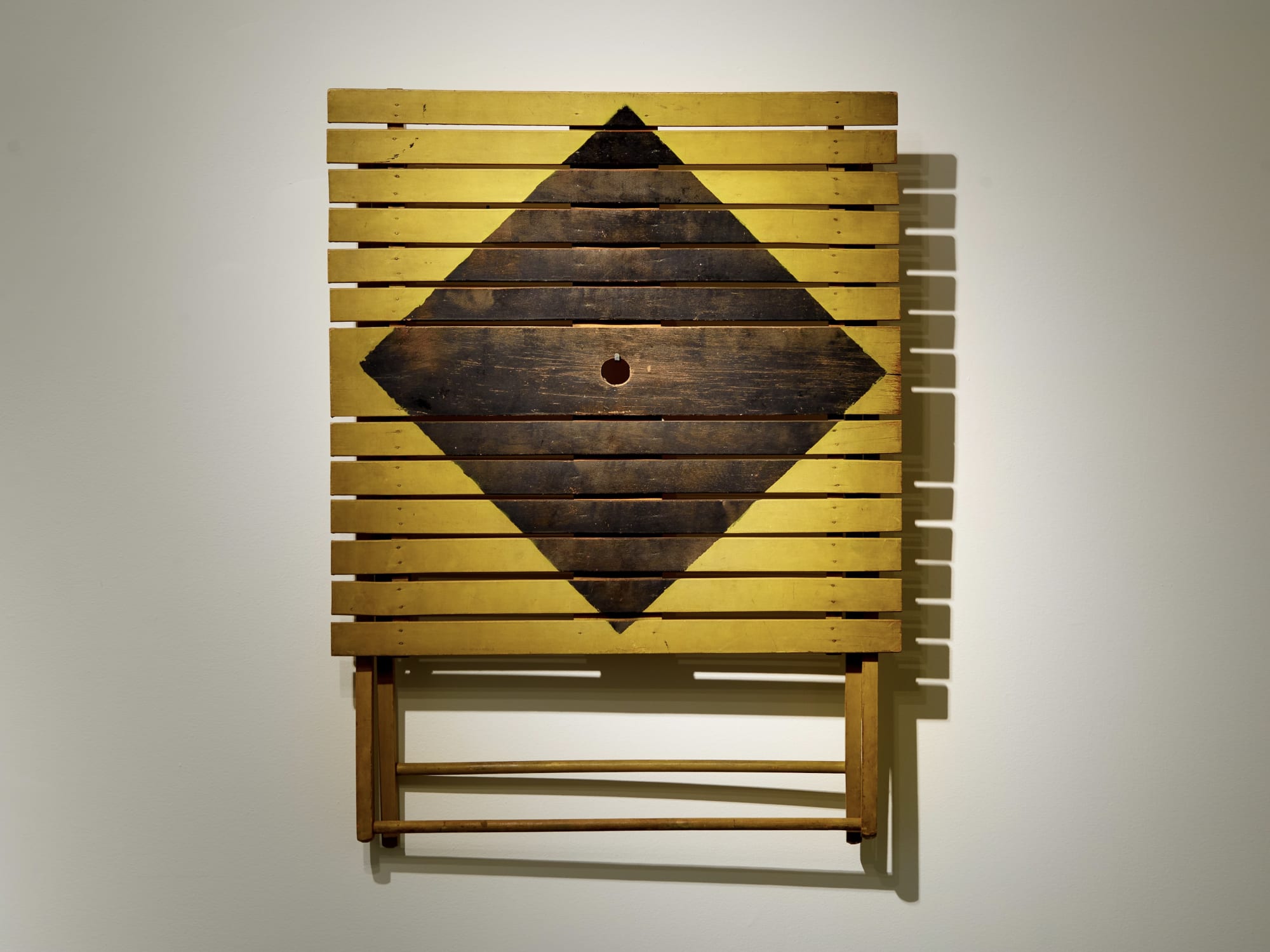 Folding Picnic Table, ca. 1940-50 Yellow and black paint on maple wood (with custom wall mount) 36 x 27 3/4 x 3 1/4 in. (91.4 x 70.5 x 8.3 cm.) (AU 226) SOLD