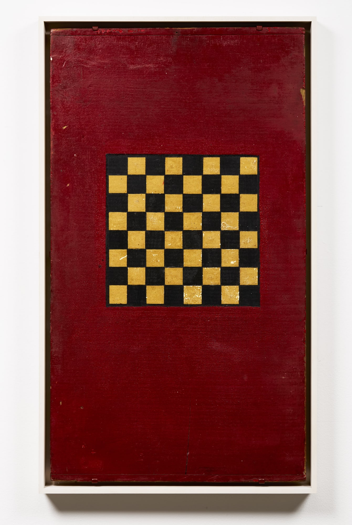 Checkers Game Board, late 19th - early 20th century Wood with deep red, yellow, and black polychrome 30 x 16 in (76.2 x 40.6 cm) (ArU 483) SOLD
