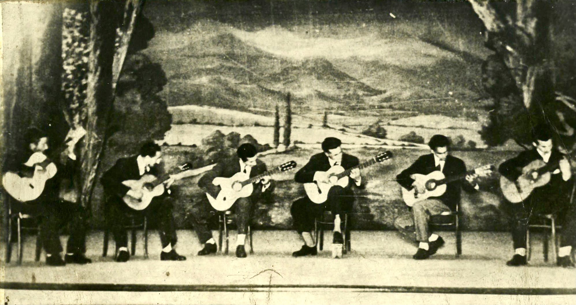 Domingo Guccione (third from right to left) playing in a concert at the Cine Teatro París in Necochea, Argentina, ca. 1950 / Photograph courtesy of the artist's estate.