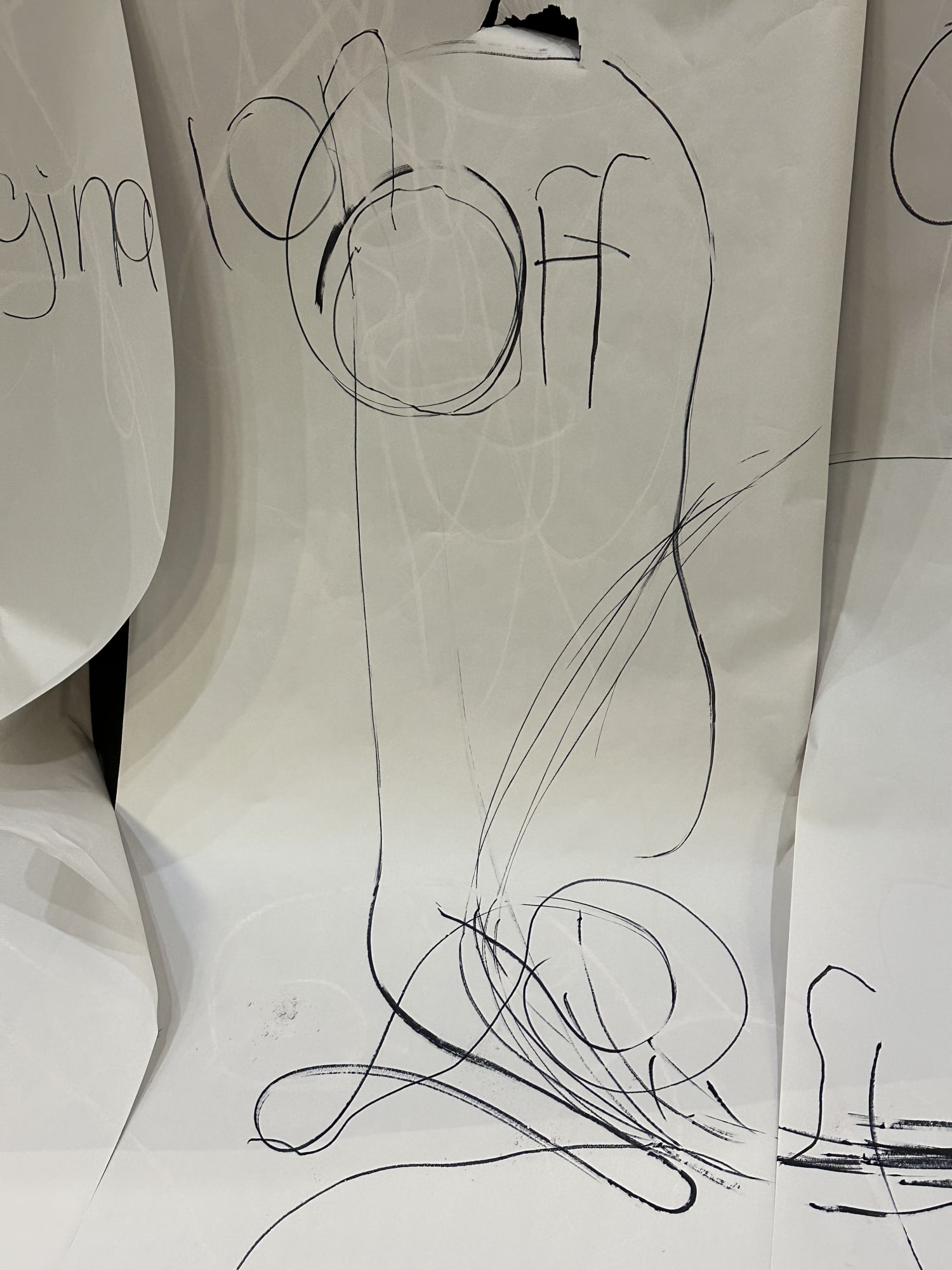 Performance O, 2023. Drawing paper, marker, chalk, tape player, cassette, bagel, voice; 13:00. With Saskia Globig