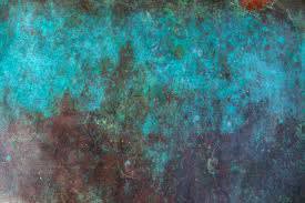 PATINA A patina is a thin layer that forms on the surface of copper, brass, bronze, and similar metals and alloys through age and exposure.