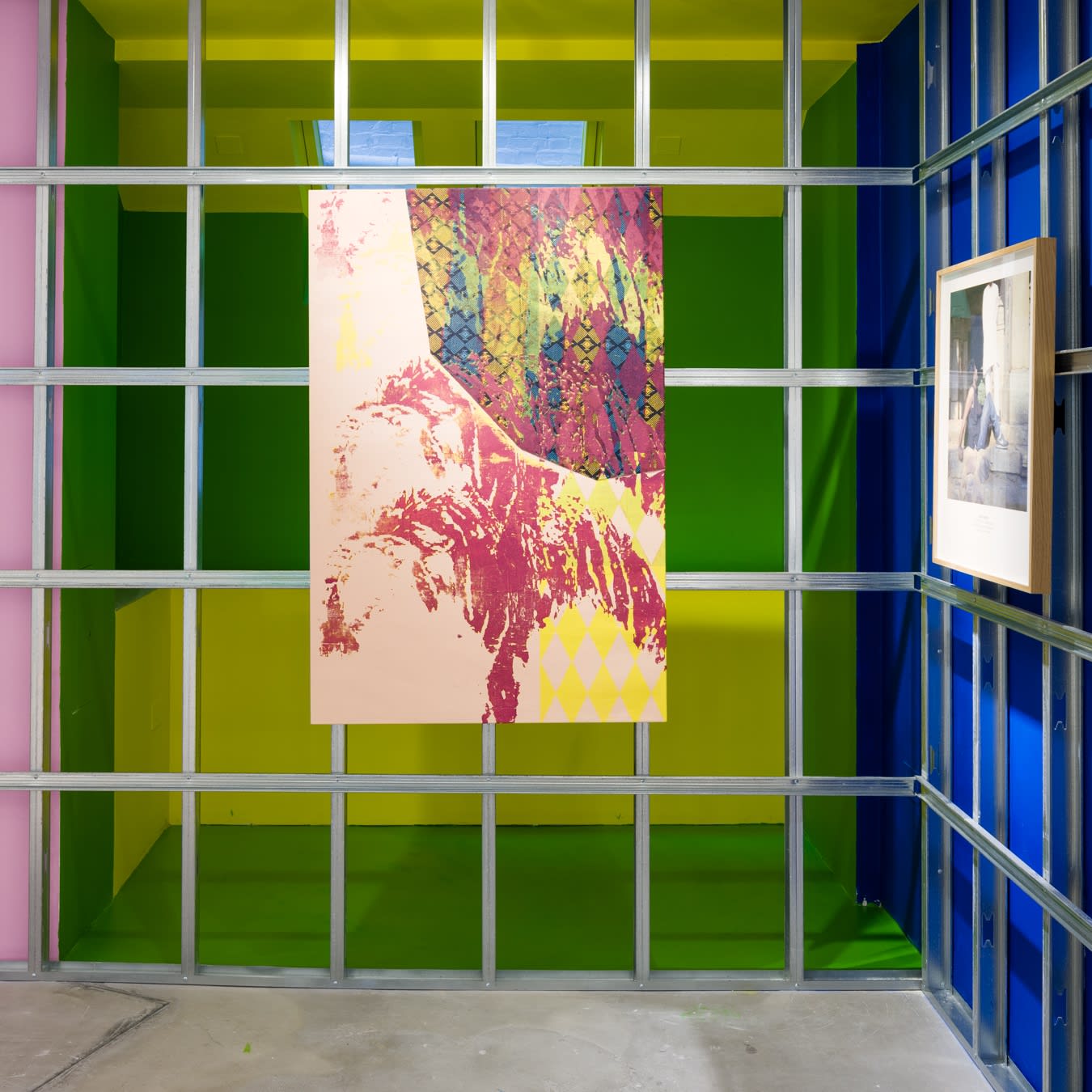 From left to right: Shezad Dawood, Mating Tigers, 2021, acrylic and vintage textile on canvas; Sunil Gupta, Lodhi Gardens, 1987, archival inkjet print