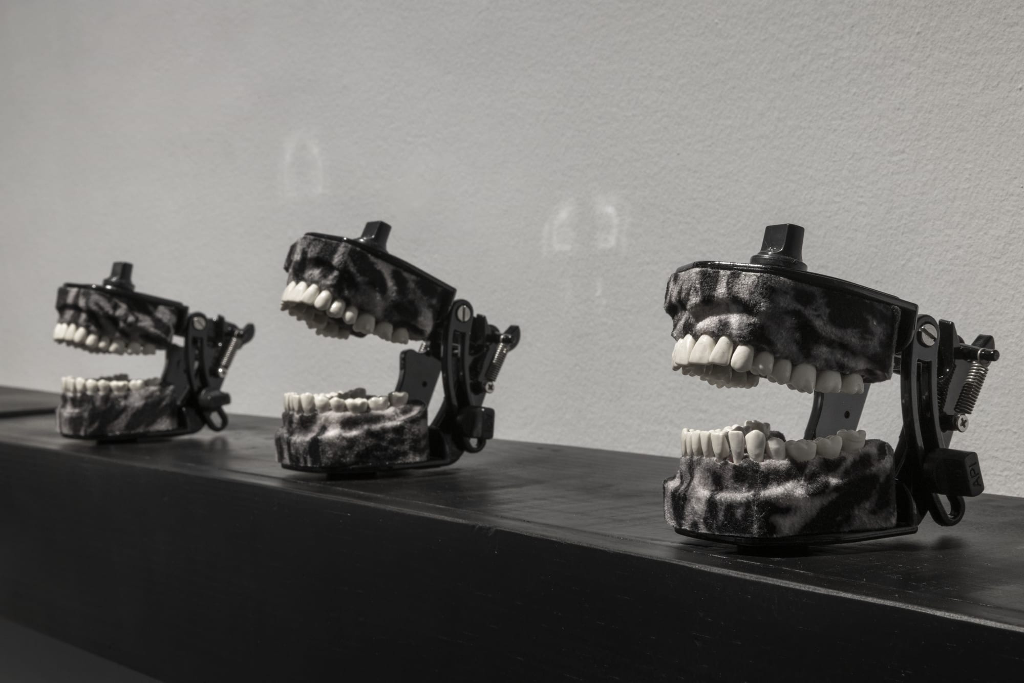 Anita Dube Foot Soldiers Wood, plastic, velvet, paint, glue, motor, power supply and wire