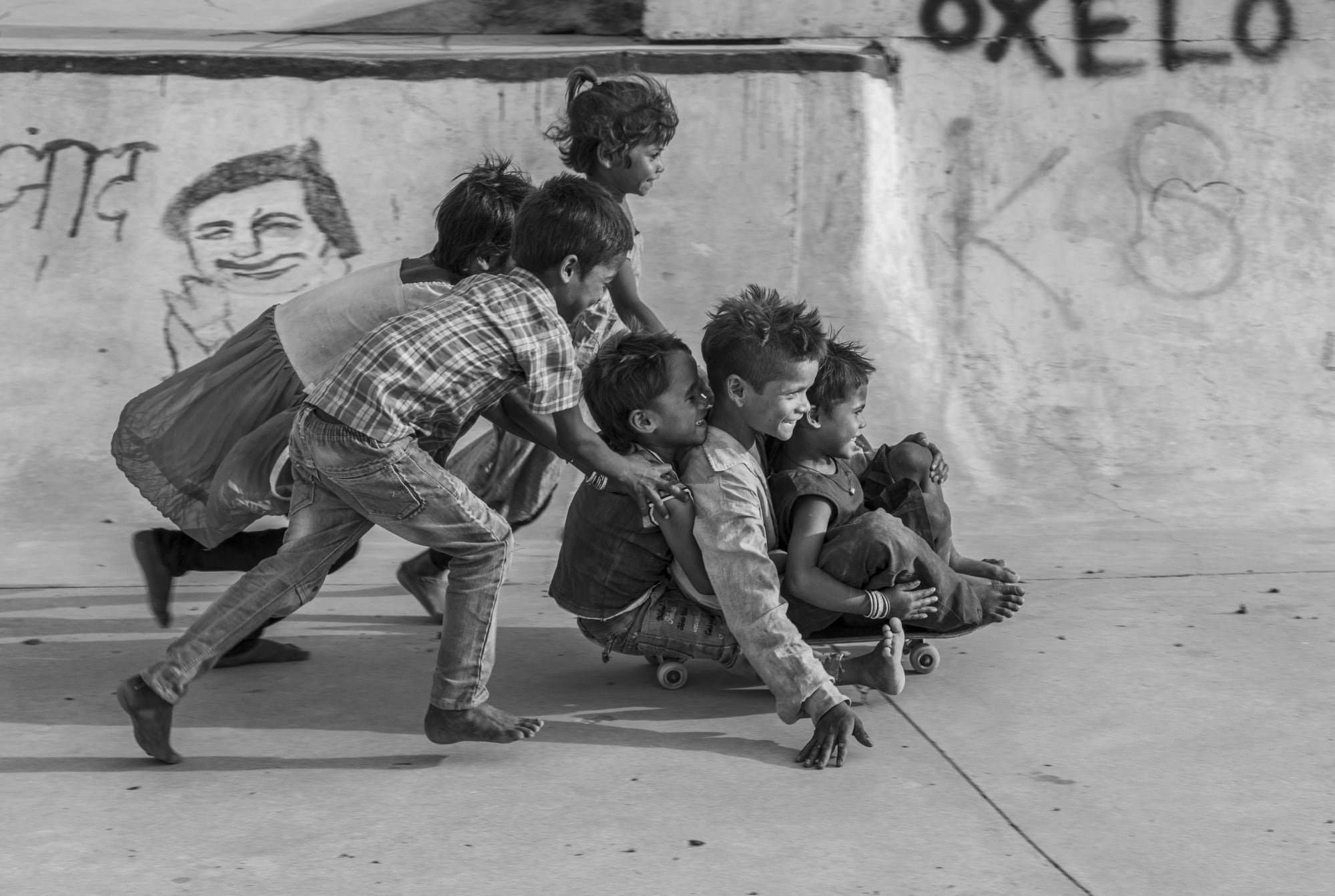 Chotu, 5 yrs, Sahina, 5 yrs, Chahna, 5 yrs, Raja, 4 yrs, Bali Ram, 10 yrs, Rohini, 4 yrs, Janwaar Village, Madhya Pradesh, India (from the series Janwaar Castle) Archival pigment print 24 x 36 in