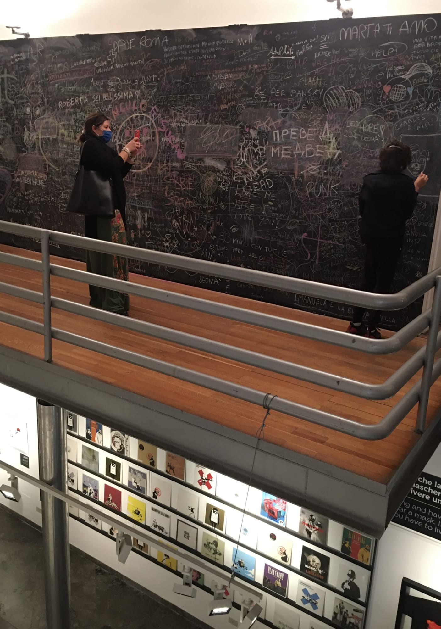 Banksy artworks hanging on wall