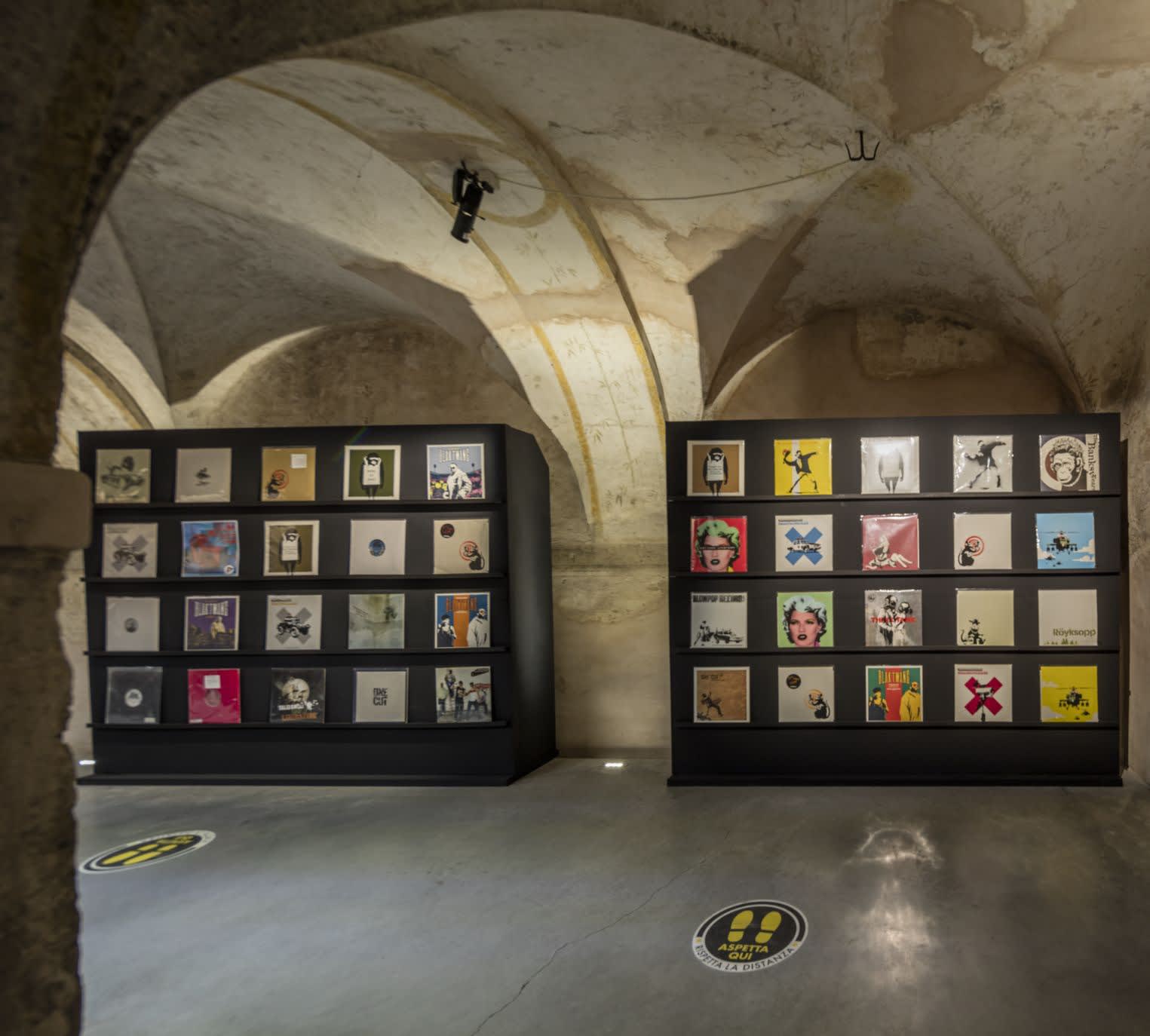 Banksy artworks hanging on wall