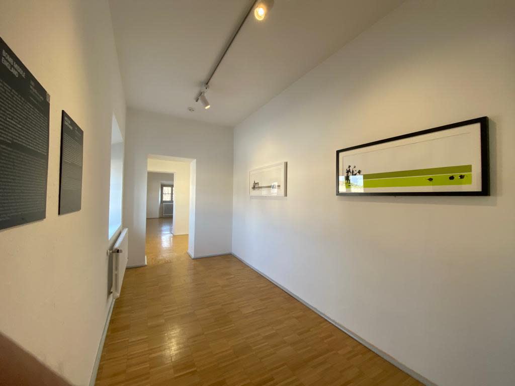 Banksy artworks hanging on wall
