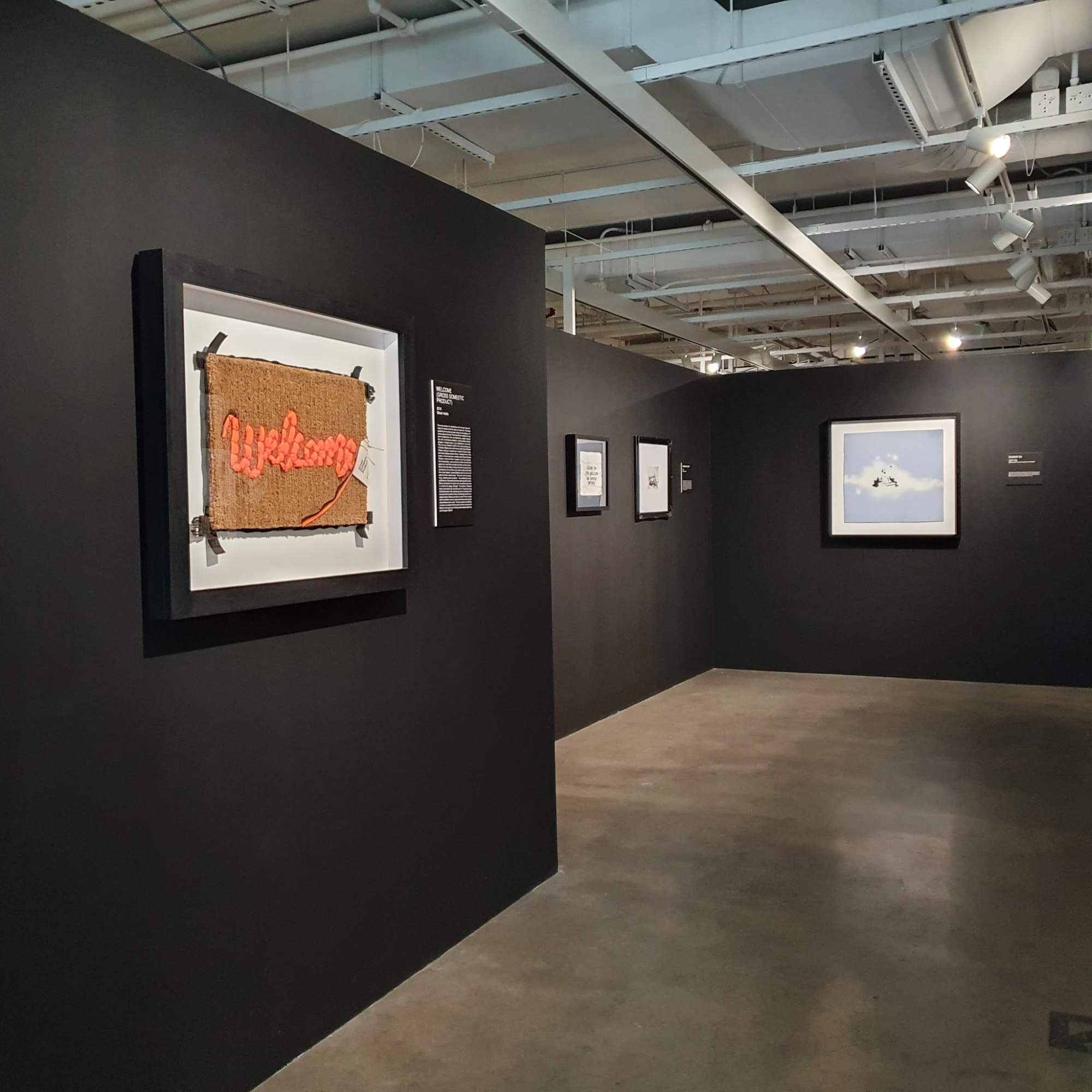 Banksy artworks hanging on wall