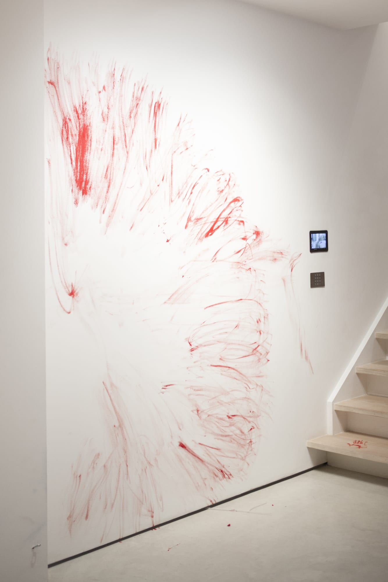 William Mackrell out of reach. red acrylic paint on wall