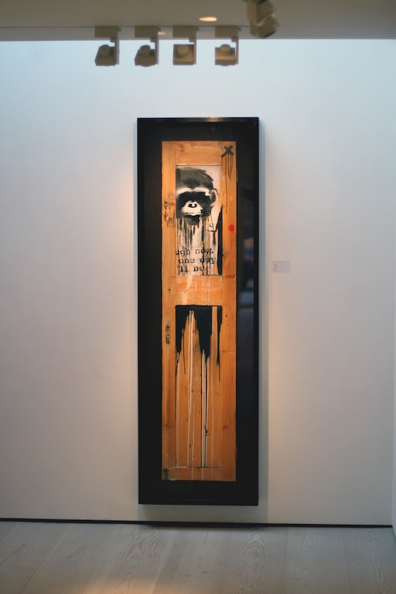 Banksy artworks hanging on wall