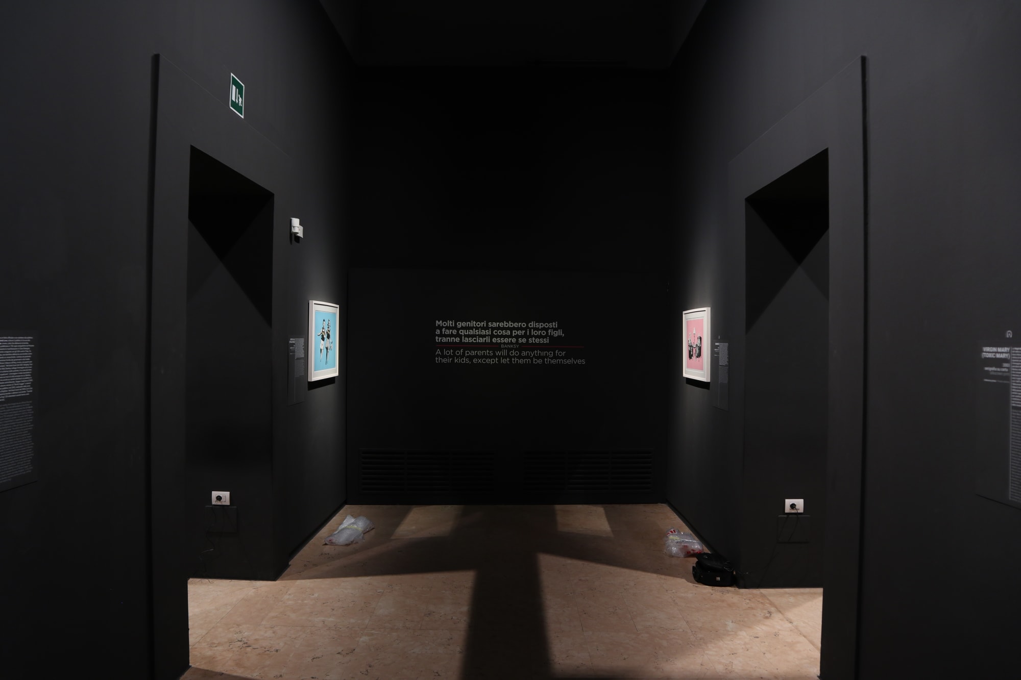 Banksy artworks hanging on wall