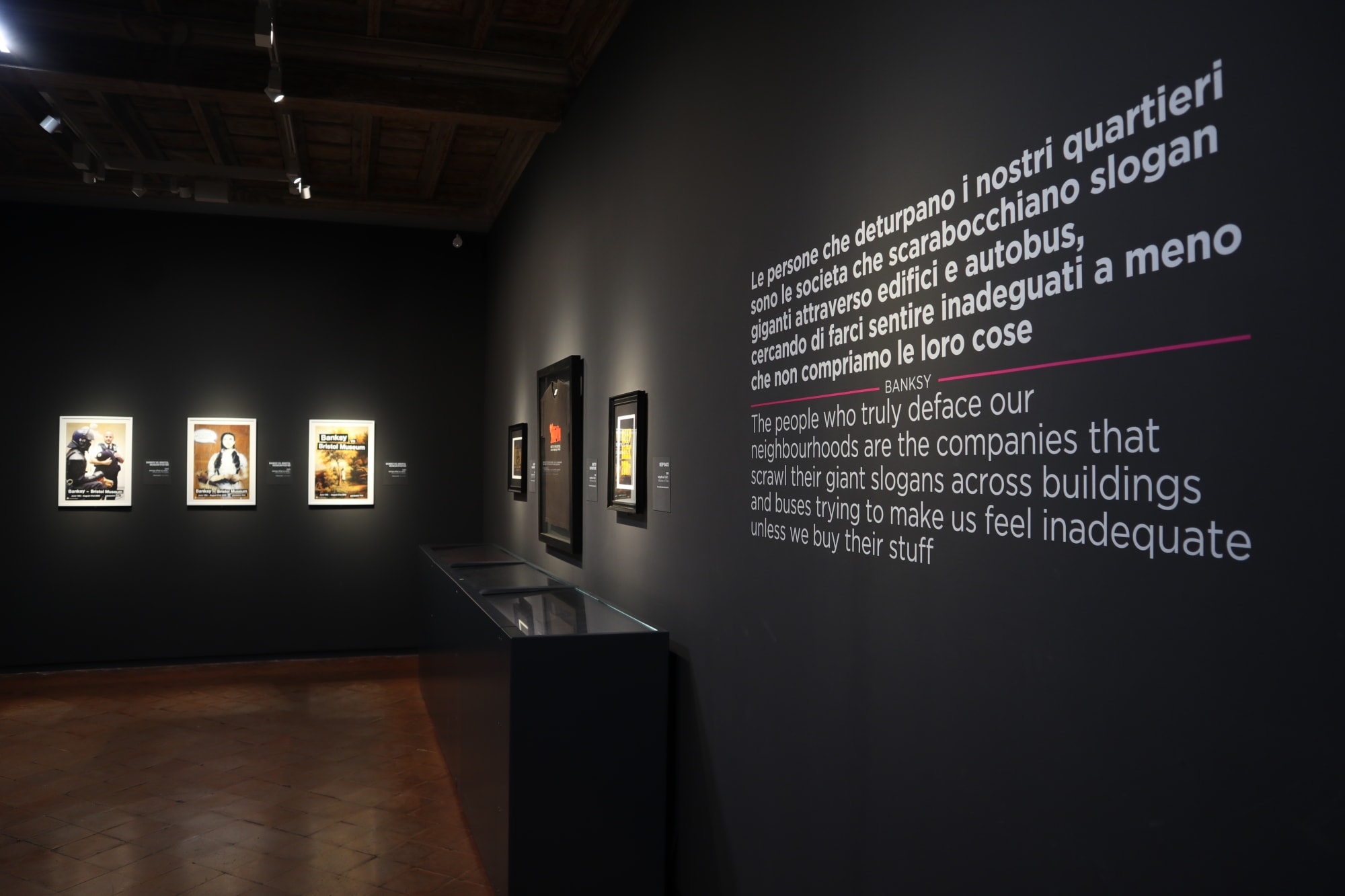 Banksy artwork hanging on wall