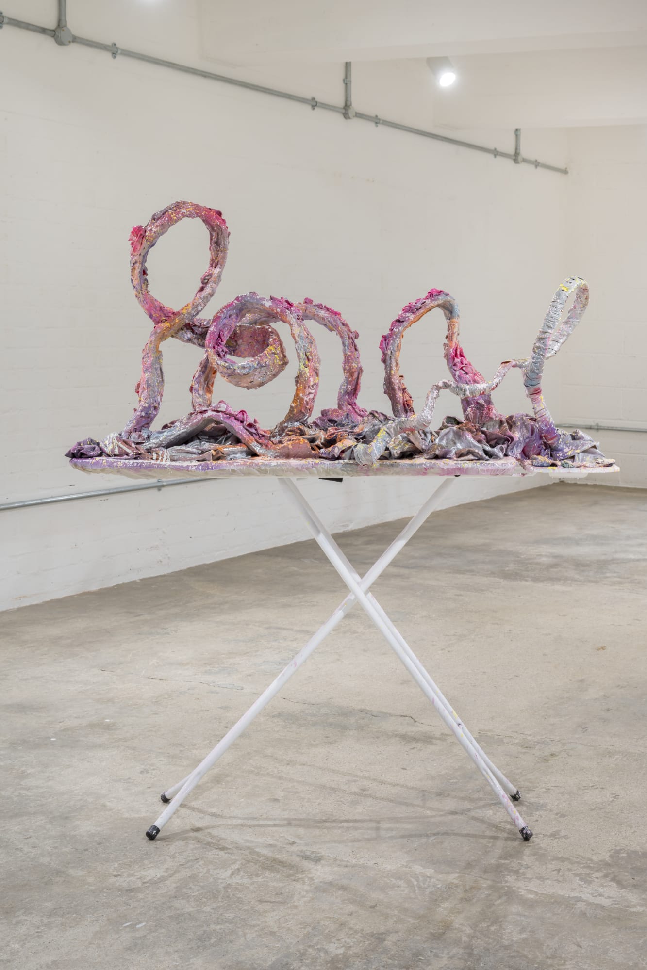 Rosie Reed, Kitchen Scenes (Searching for Sex Appeal), 2023, ironing board, clay, plaster, eco-resin, jesmonite, paint, pigment and clothing, 140 x 120 x 64 cm