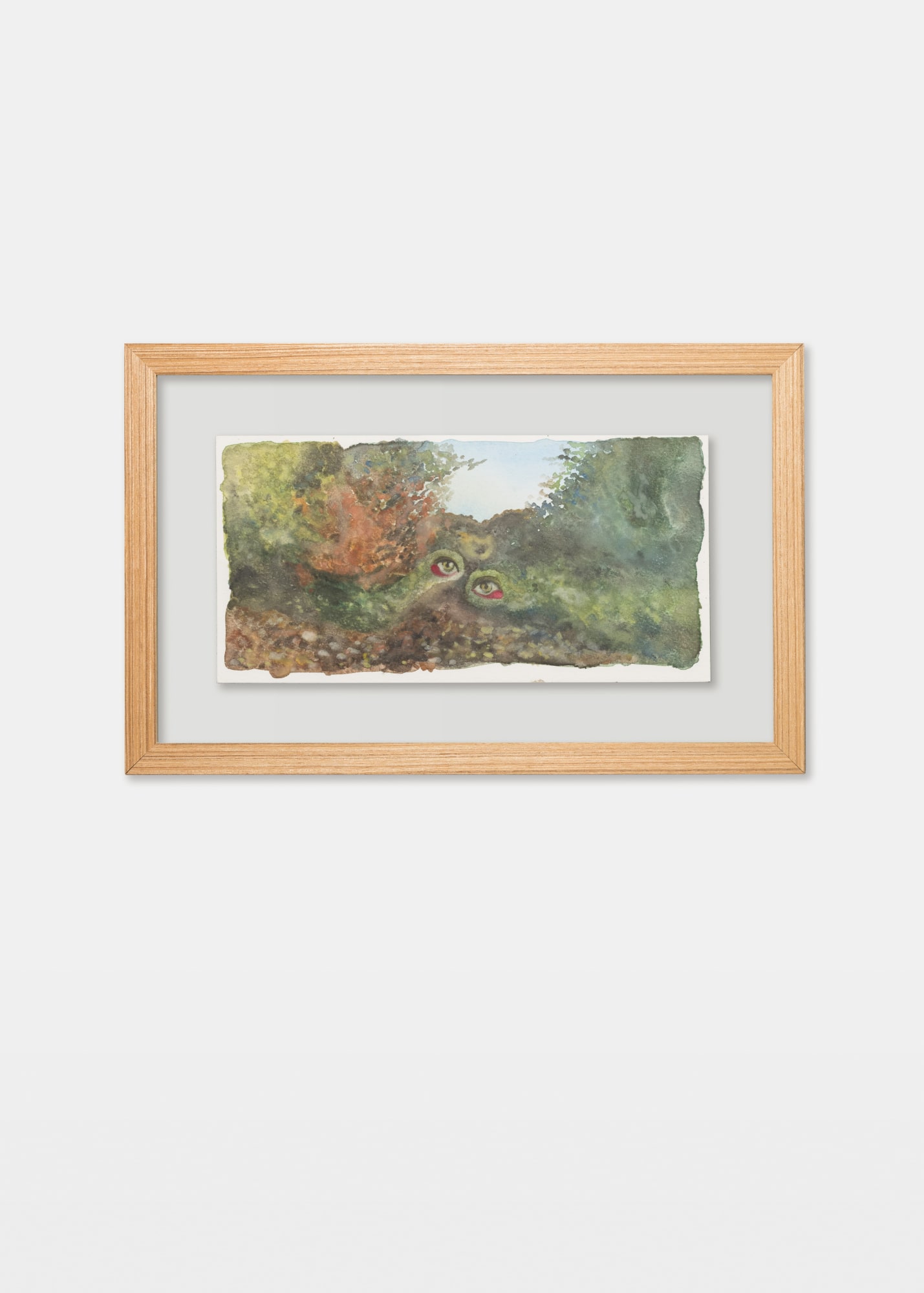 Watercolour painting by Kuwaiti artist Alymamah Rashed showing a mystical forest with eyes embedded in the landscape.