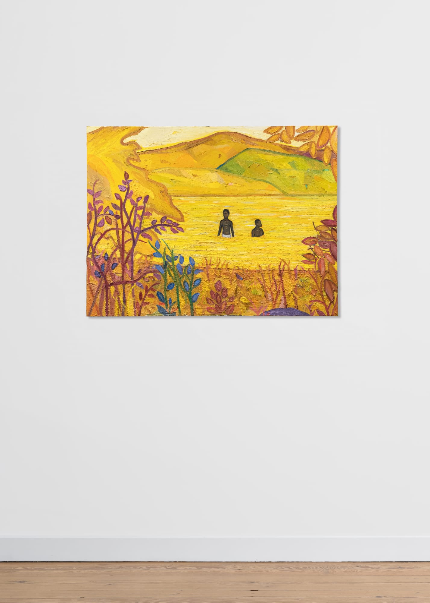 Installation view of “Endless” by Stephen Price at Galerie REVEL, showing two figures immersed in a golden landscape