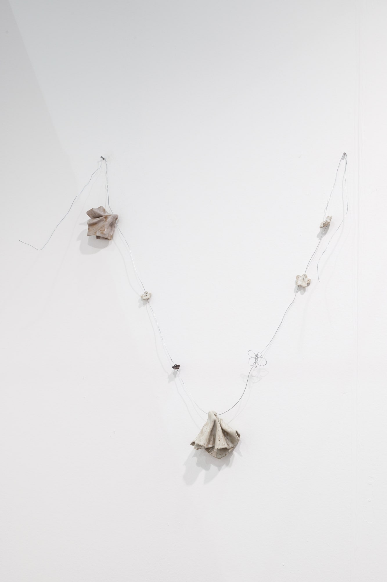 Masha Silchenko Ghosts necklace, 2023 ceramic, enamel Variable