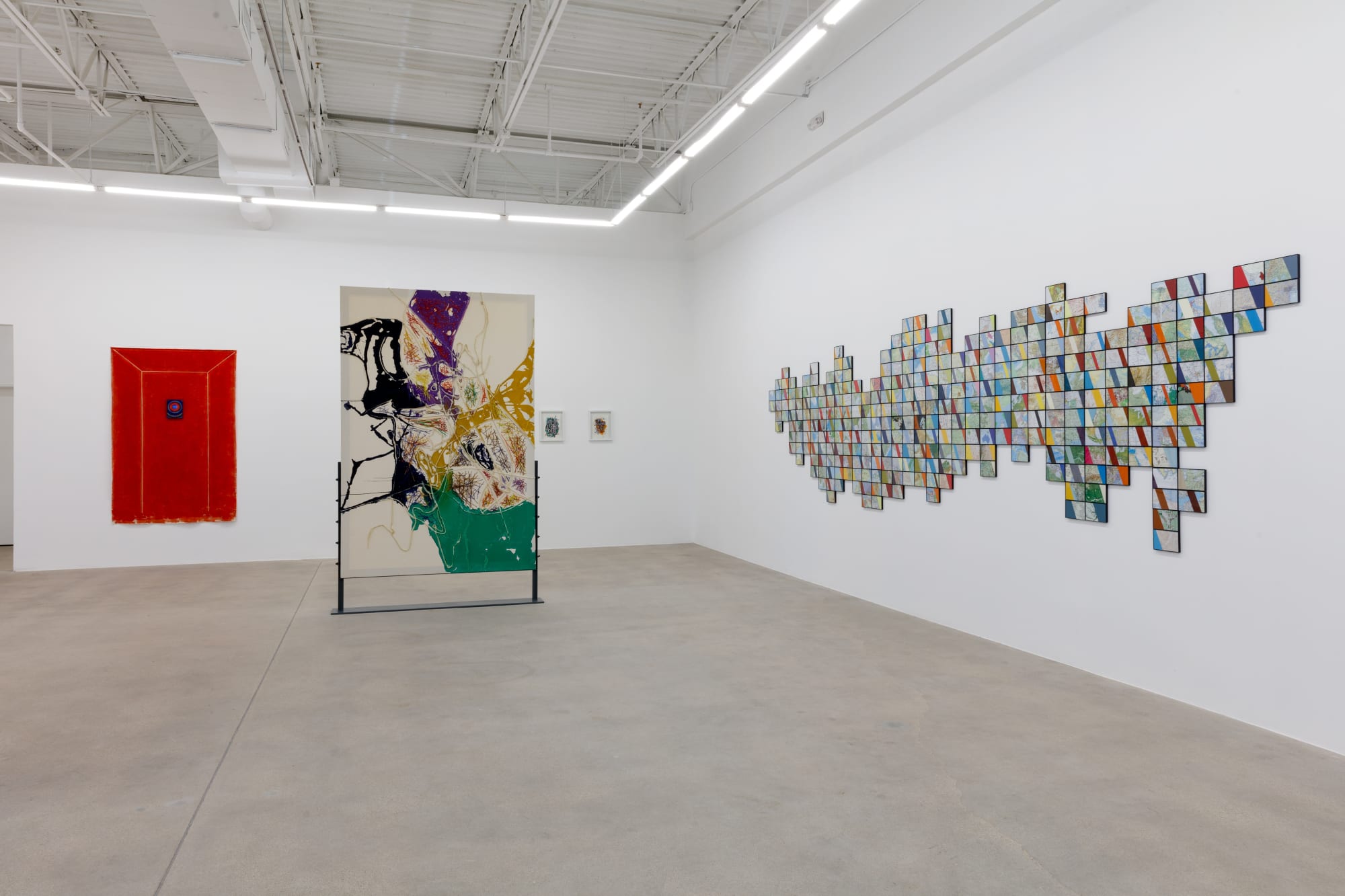 installation view of How Far is In-Between, featuring paintings and drawings