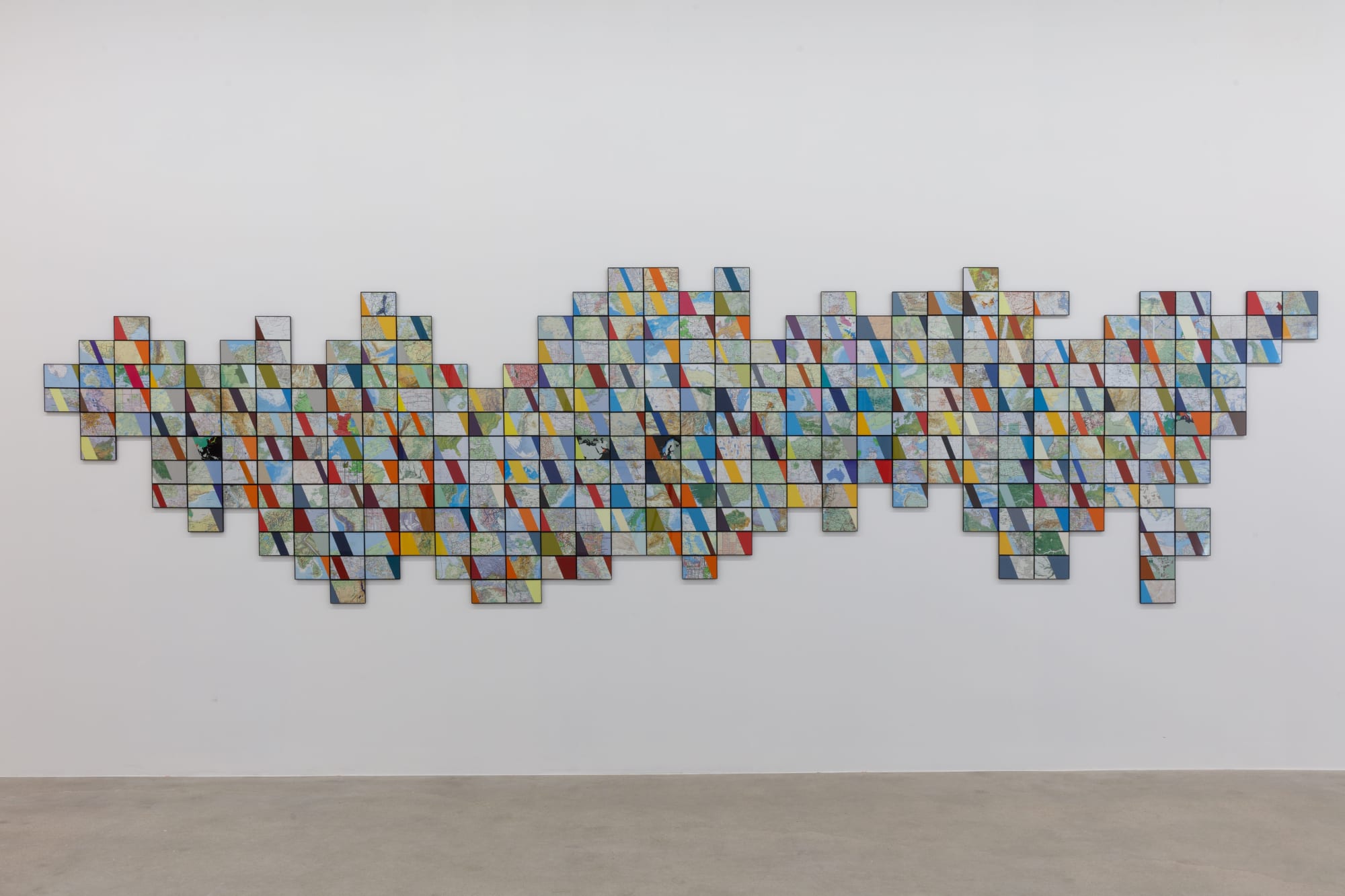 installation view of How Far is In-Between, featuring paintings and drawings