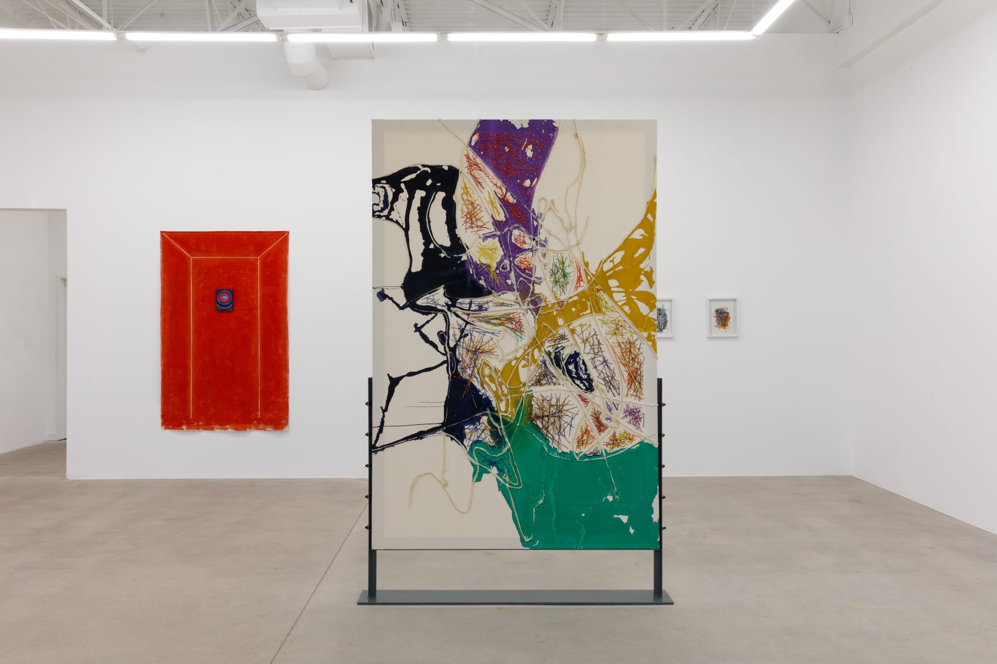 installation view of How Far is In-Between, featuring paintings and drawings